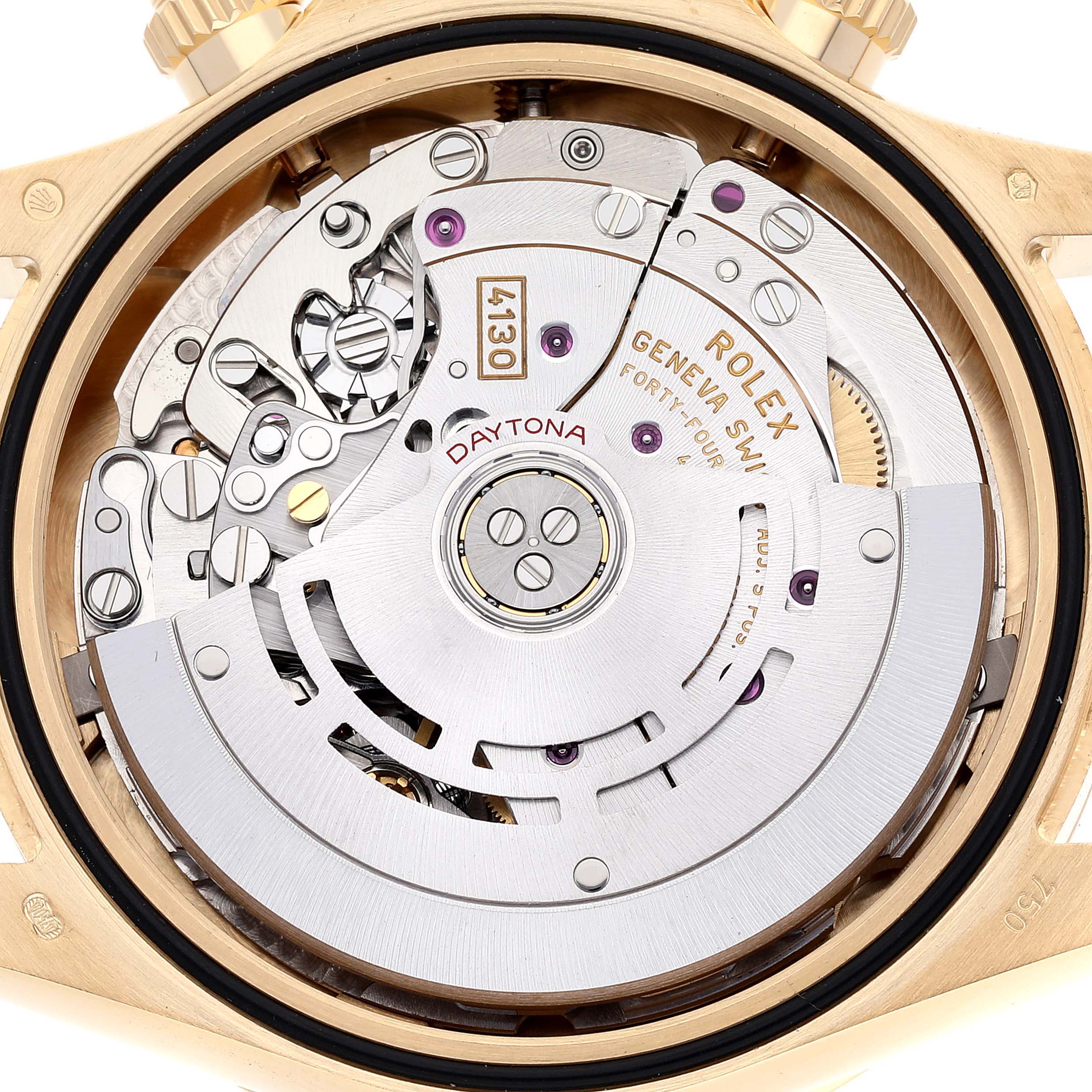 The image shows a close-up of the back of a Rolex Daytona 116508 Men's Yellow Gold Green Dial 116508 Men's Yellow Gold Green Dial watch, revealing its intricate internal movement.