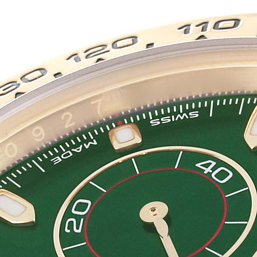 The image shows a close-up of the dial and tachymeter bezel of a Rolex Daytona 116508 Men's Yellow Gold Green Dial 116508 Men's Yellow Gold Green Dial watch, highlighting the green dial and part of the subdial.