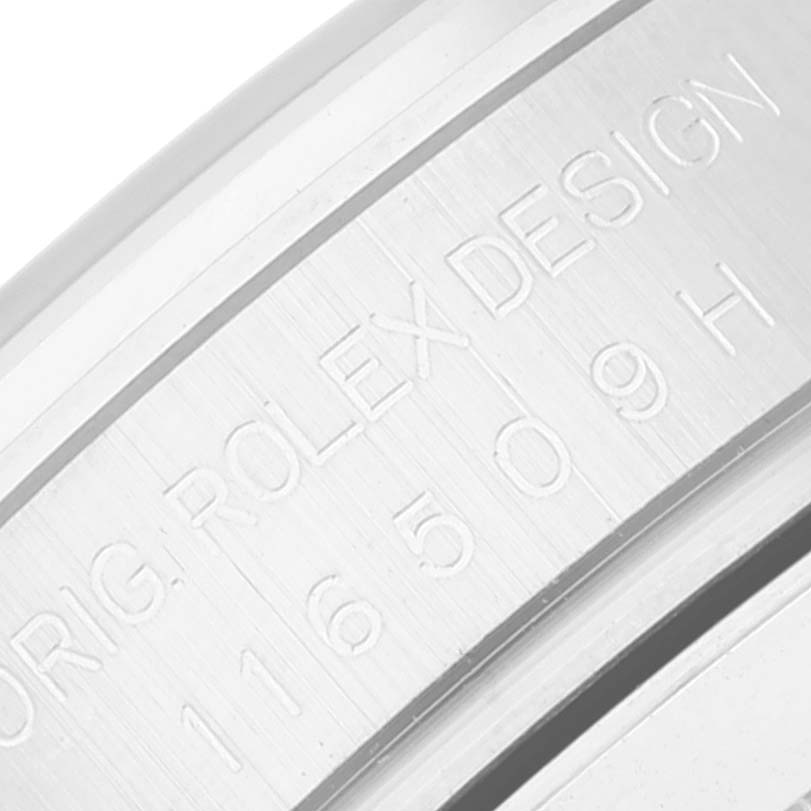 This is a close-up of the serial number engraving on the case of a Rolex Daytona 116509 Men's White Gold Blue Dial 116509 Men's White Gold Blue Dial watch.