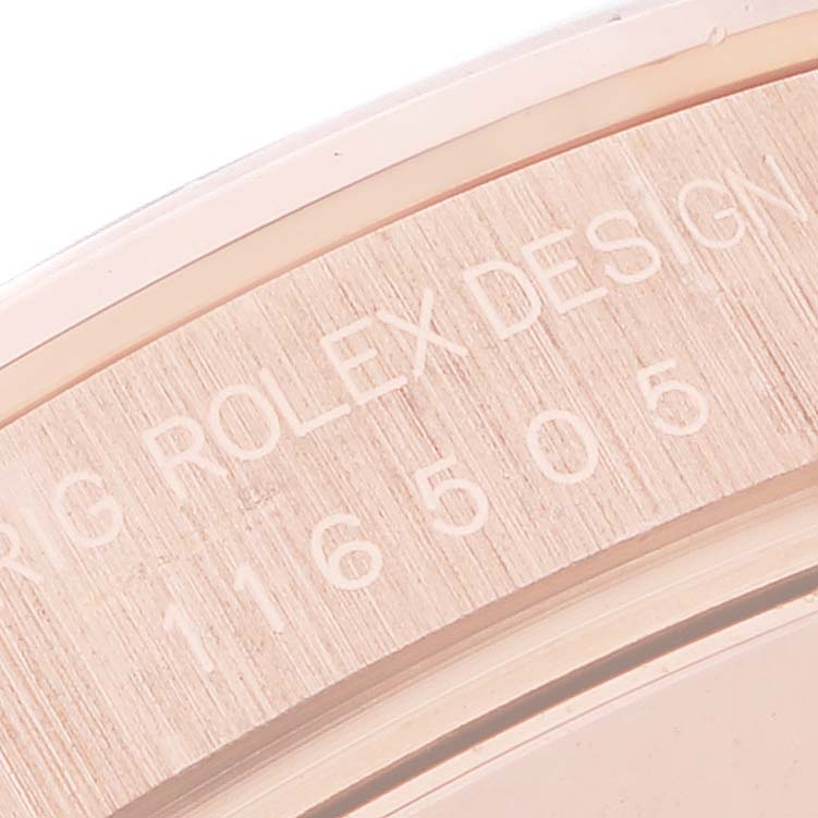 The image shows a close-up view of the side/edge of a Rolex Daytona 116505 Men's Rose Gold Black Dial 116505 Men's Rose Gold Black Dial watch, highlighting its engraved serial number.