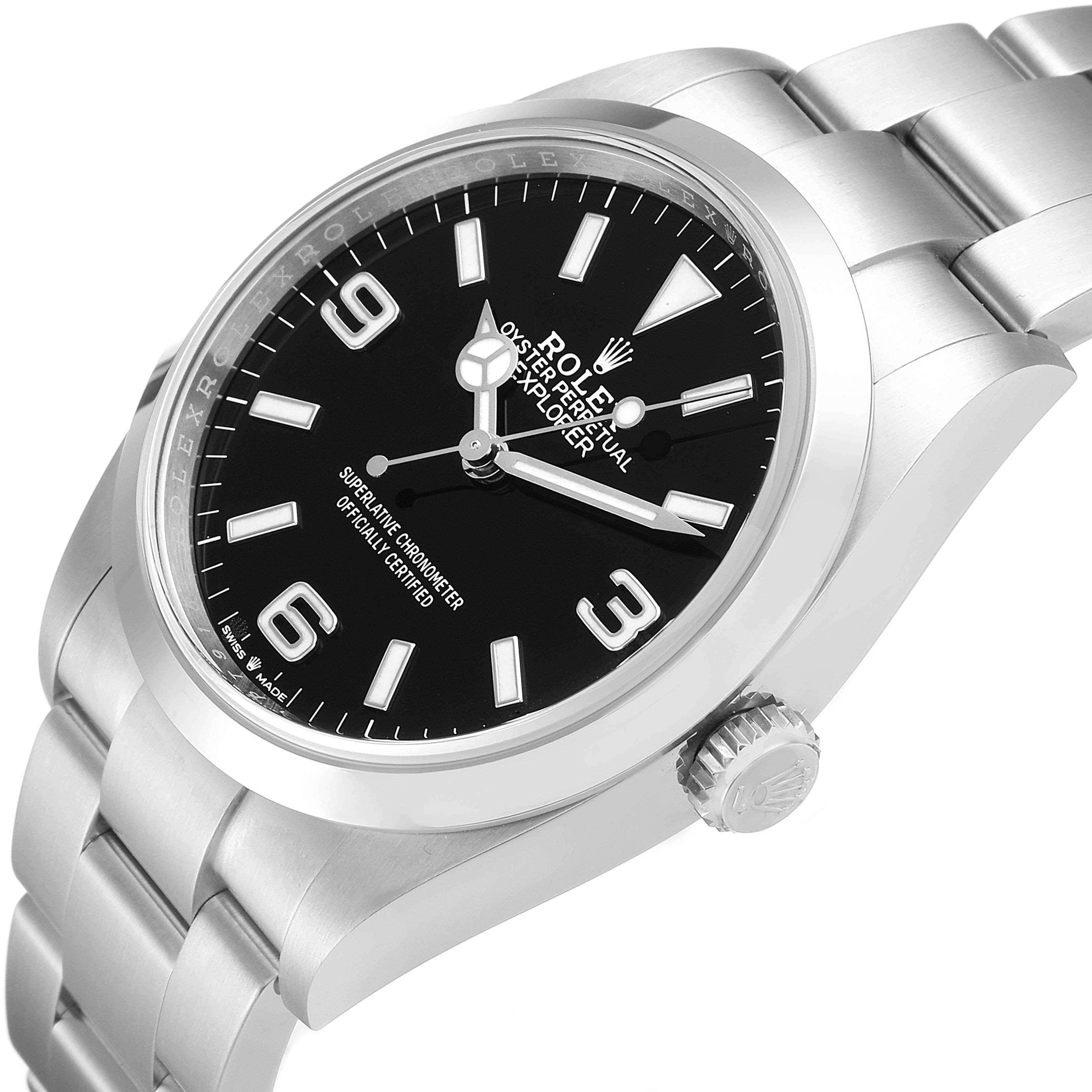 The image shows a Rolex Explorer 124270 Men
s Stainless Steel Black Dial 124270 Men
s Stainless Steel Black Dial watch from an angled top-down view, highlighting the black dial, bezel, crown, and stainless steel bracelet.