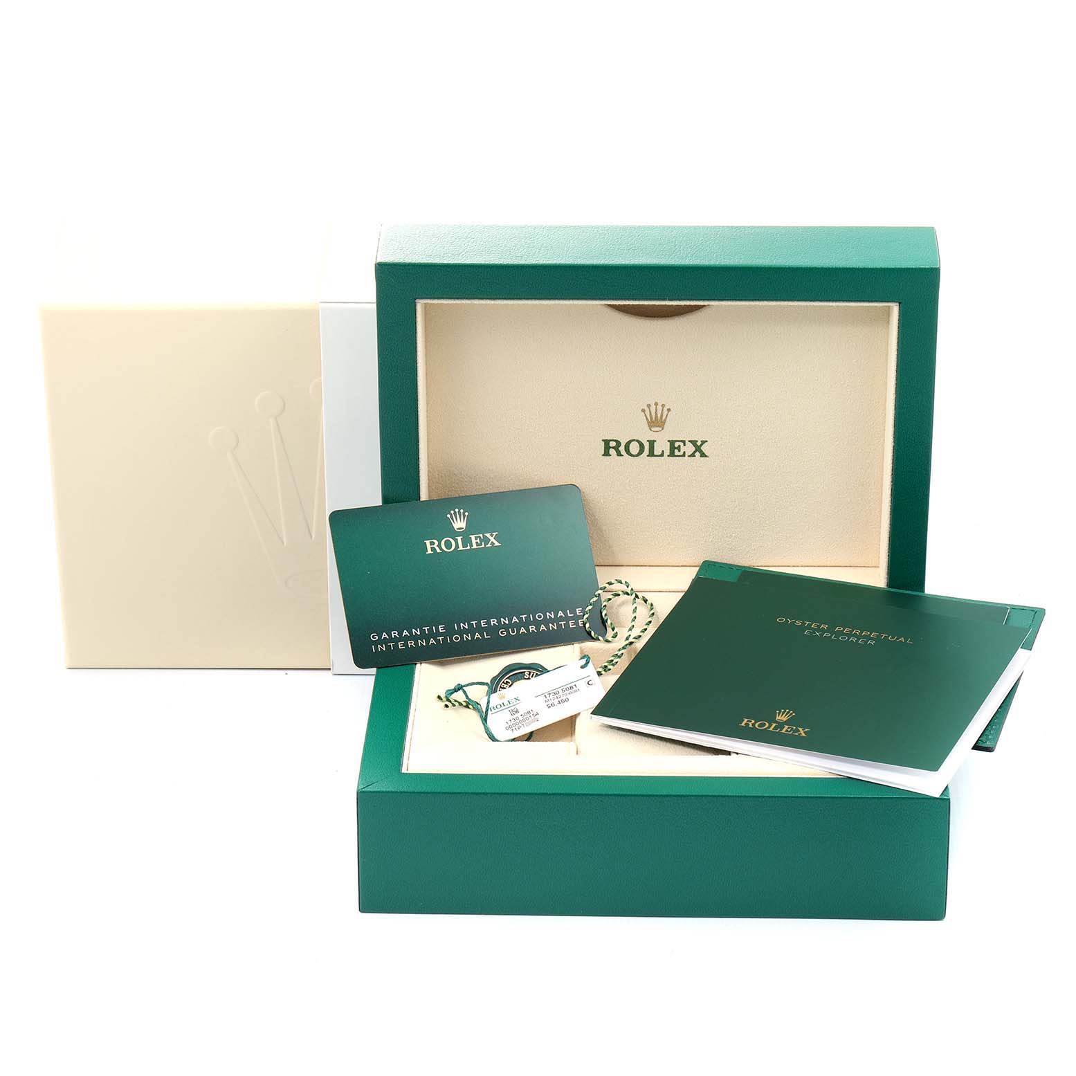 The image shows the packaging and accessories, including the box, warranty card, hang tag, and manual for the Rolex Explorer 124270 Men
s Stainless Steel Black Dial 124270 Men
s Stainless Steel Black Dial watch.