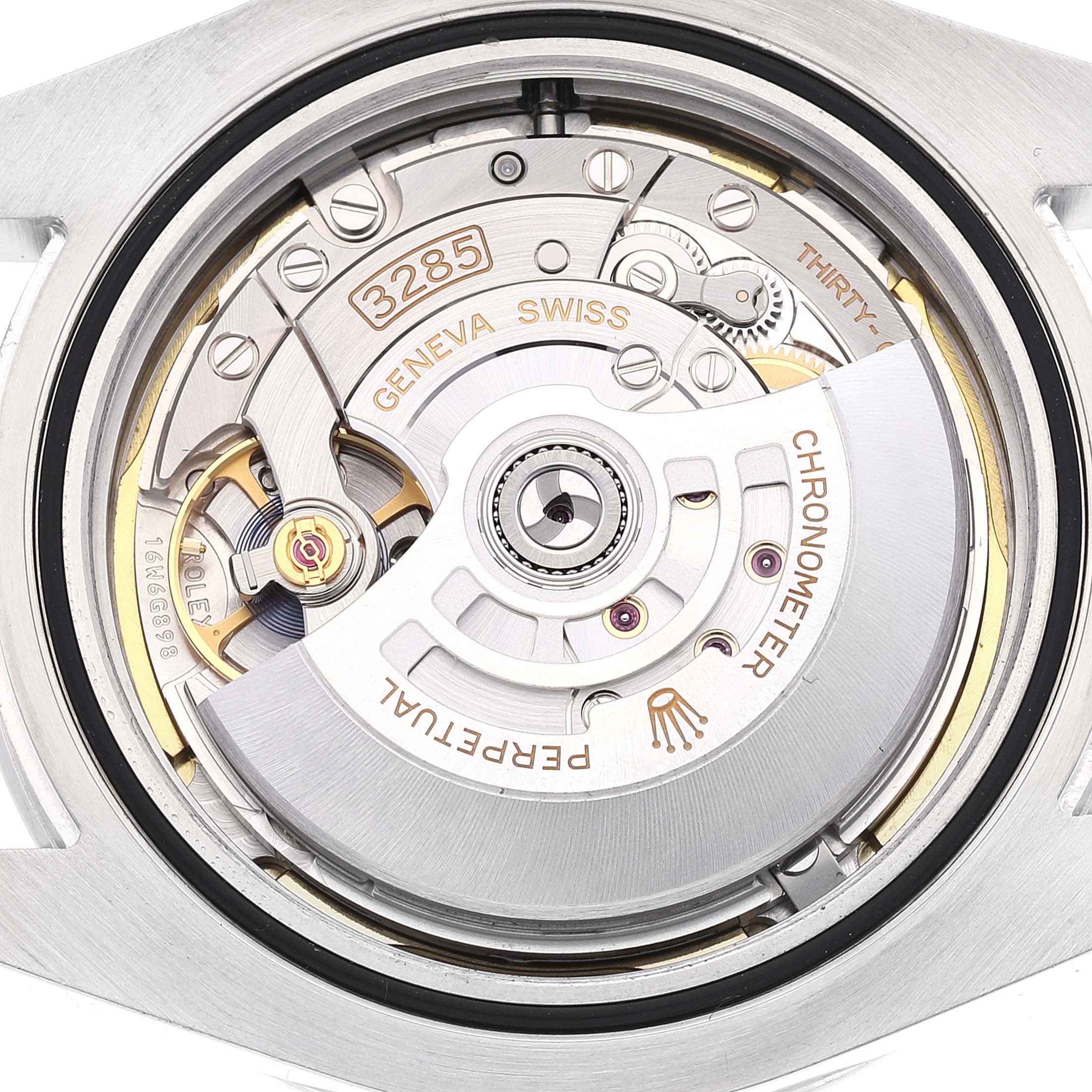 The image shows the movement of the Rolex Explorer model 226570 from a top angle, highlighting the automatic rotor, balance wheel, and detailed inscriptions.