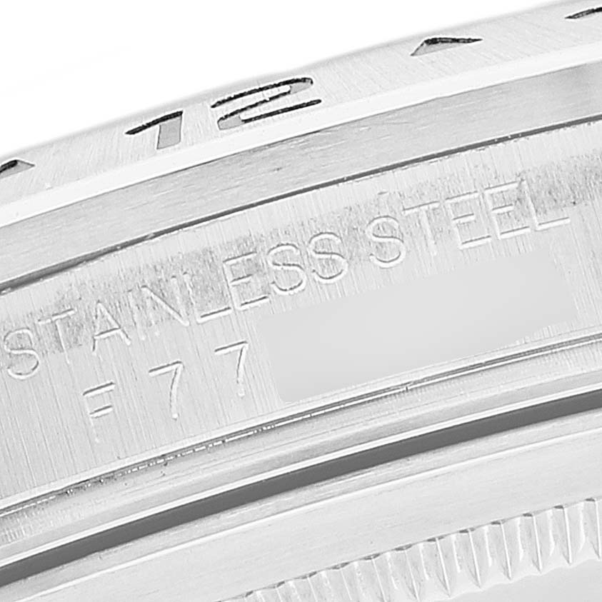 This image shows a close-up of the stainless steel inscribed part of a Rolex Explorer 16570 Men's Stainless Steel Black Dial 16570 Men's Stainless Steel Black Dial watch.