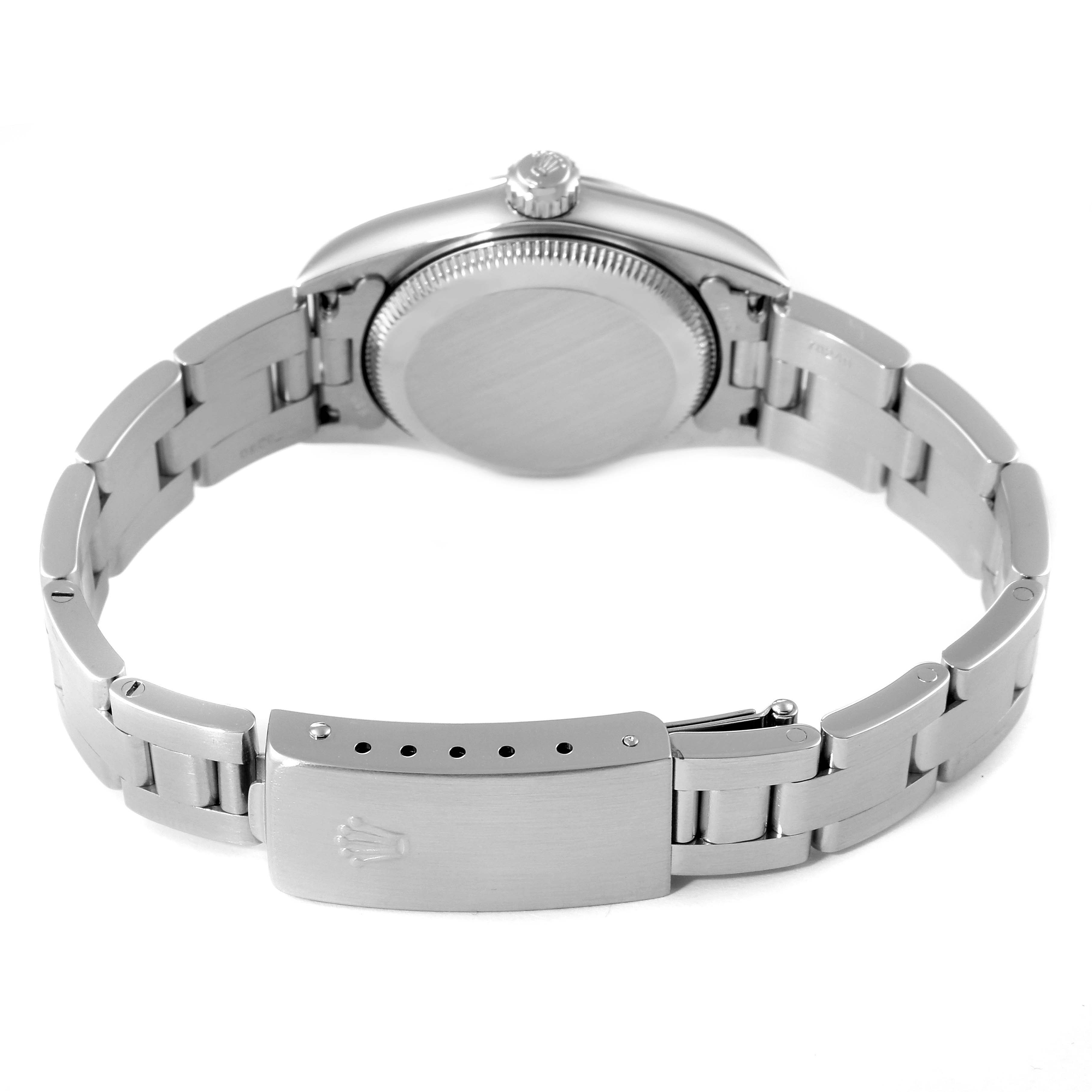 This image shows the back view of a Rolex Oyster Perpetual 76080 Women
s Stainless Steel Blue Dial 76080 Women
s Stainless Steel Blue Dial watch, highlighting its case back and bracelet with clasp.