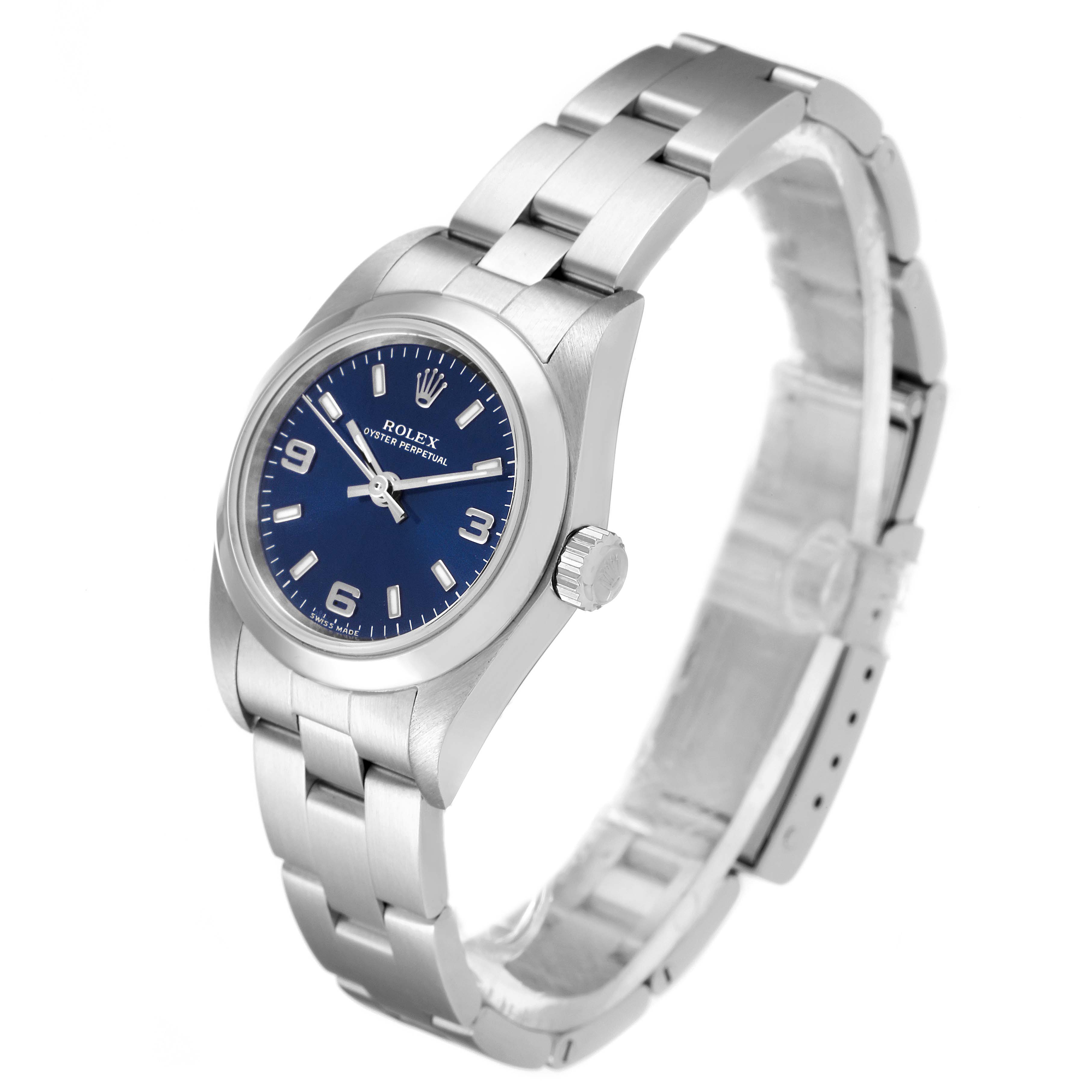 The Rolex Oyster Perpetual 76080 Women
s Stainless Steel Blue Dial 76080 Women
s Stainless Steel Blue Dial watch is shown at a slight angle, displaying the face, bezel, crown, and part of the bracelet.