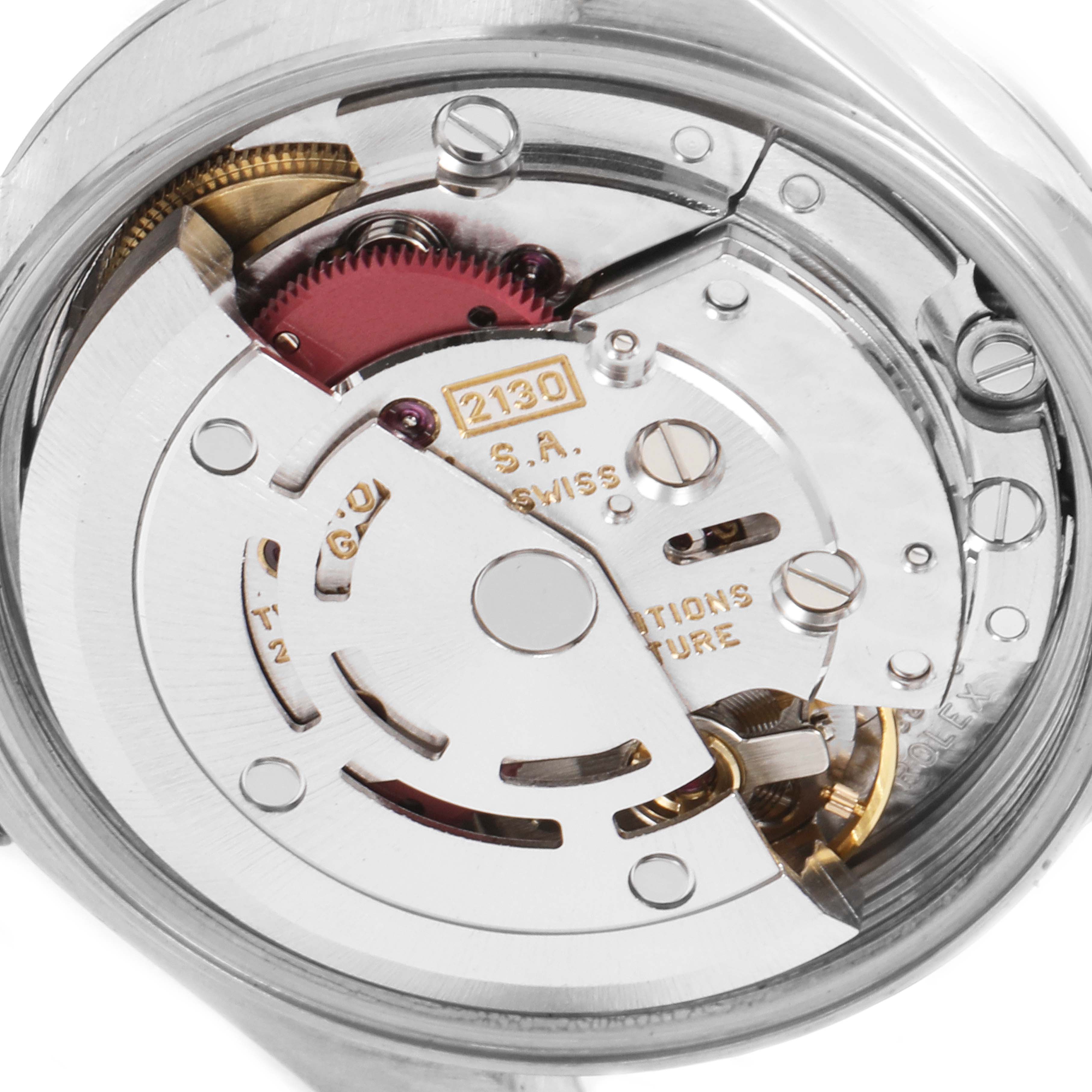 This is an internal view showing the movement mechanism of a Rolex Oyster Perpetual 67180 Women's Stainless Steel Black Dial 67180 Women's Stainless Steel Black Dial watch. 