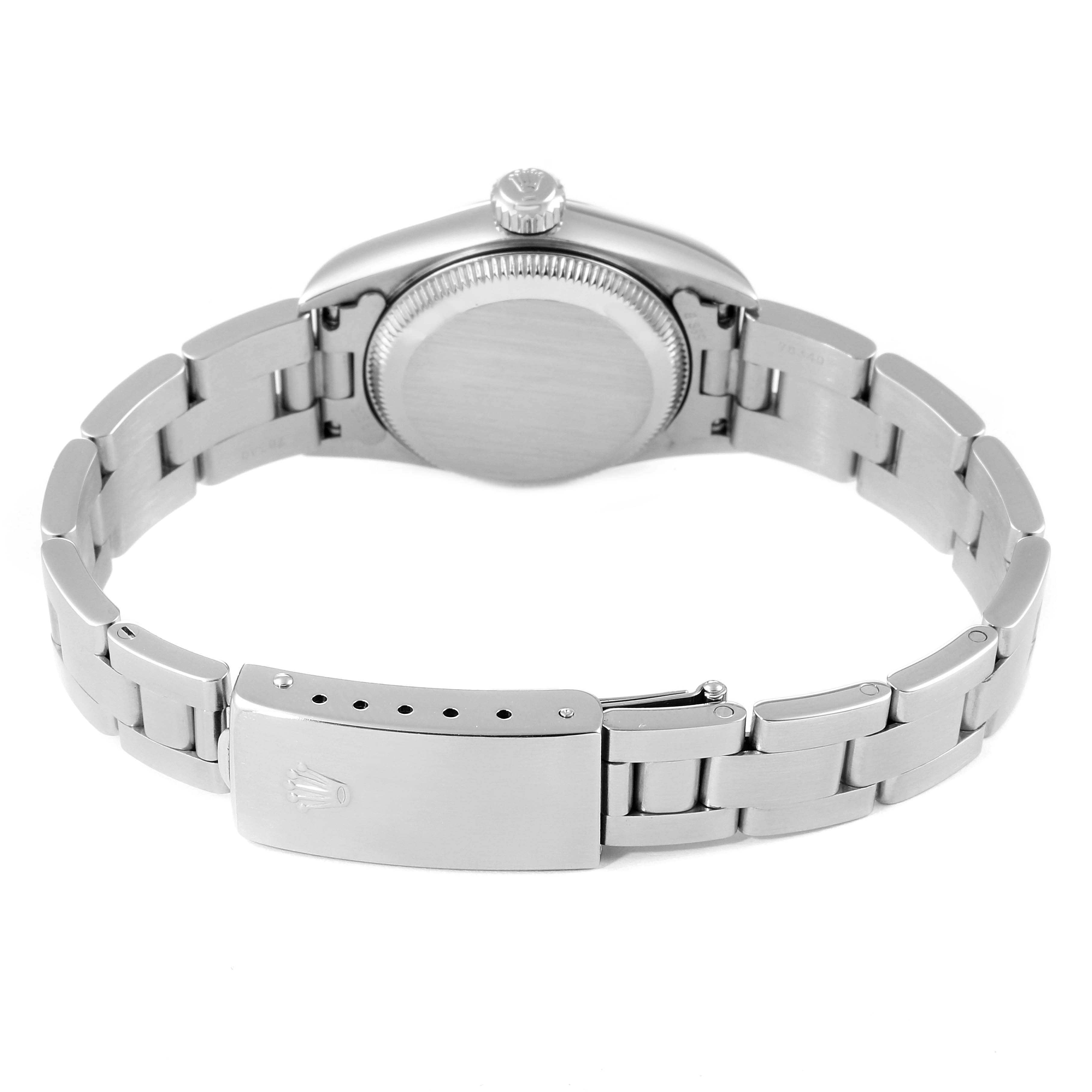 The image shows the back of the Rolex Oyster Perpetual 67180 Women's Stainless Steel Black Dial 67180 Women's Stainless Steel Black Dial watch, highlighting the bracelet and the clasp.