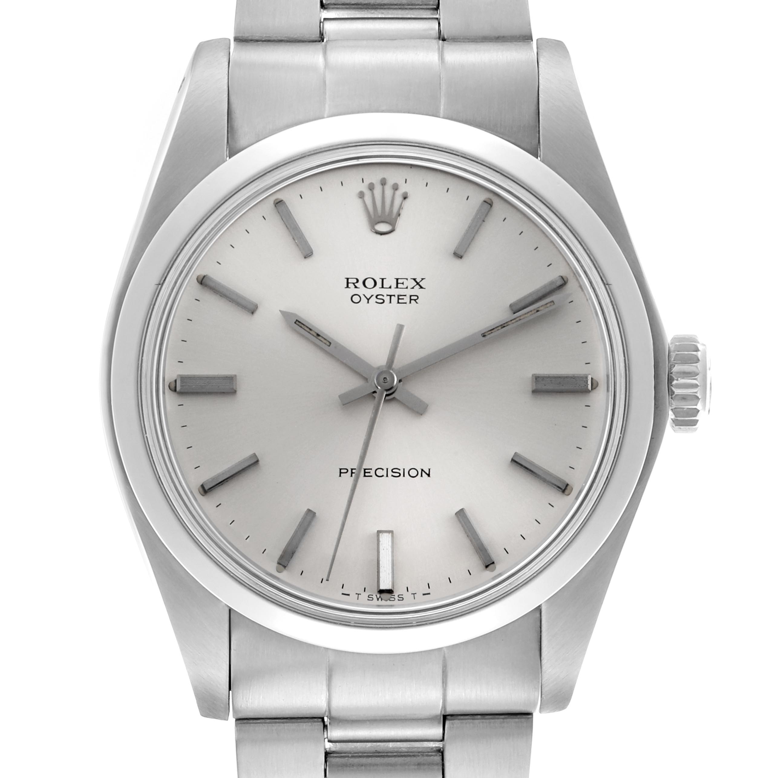 The Rolex Vintage Collection model 6426 men
s watch is shown from a top-down angle, highlighting the dial, case, crown, and part of the bracelet.
