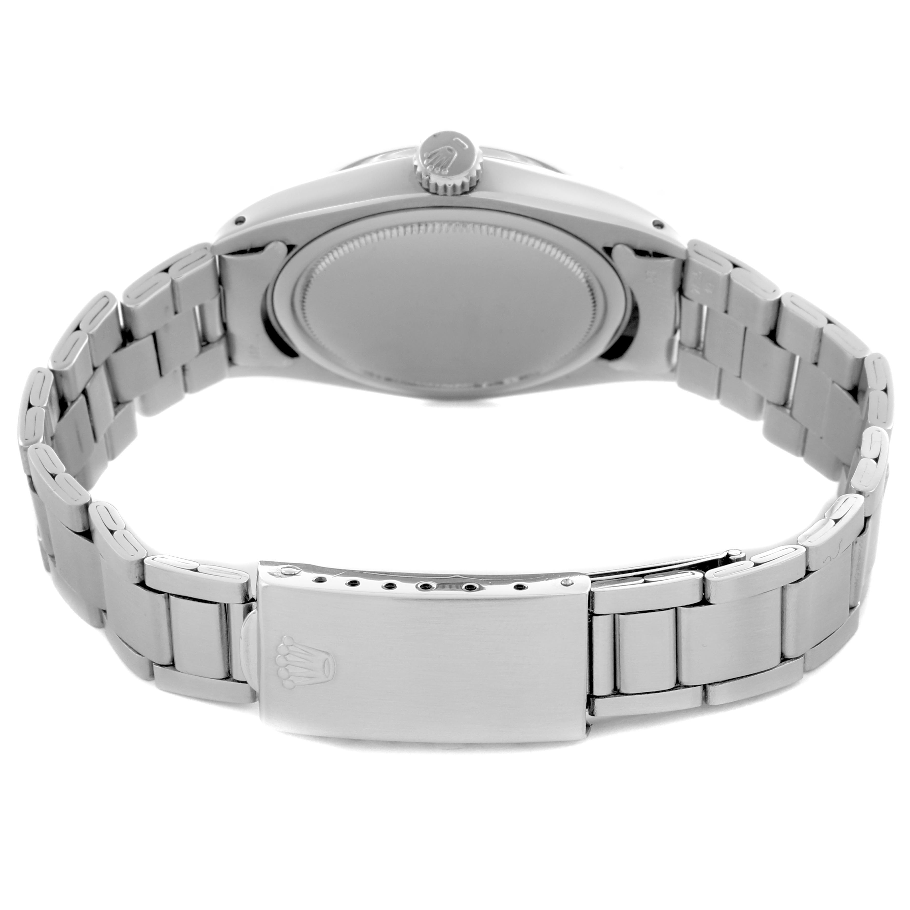 The image shows a rear angle of the Rolex Vintage Collection model 6426 men
s watch, highlighting the case back, crown, and the linked bracelet with the clasp.