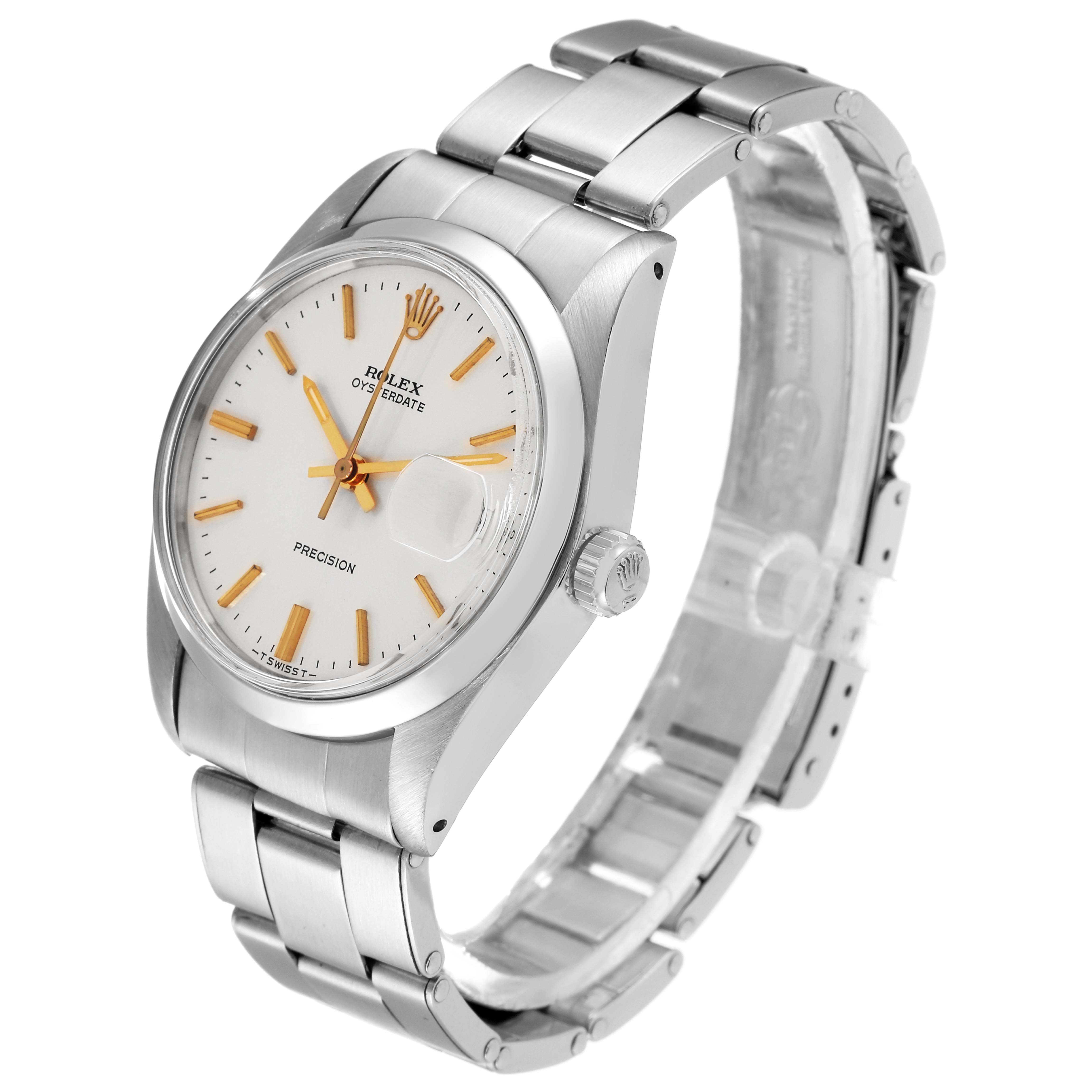 The Vintage Collection Rolex watch is shown from a three-quarter angle displaying the dial, crown, and stainless steel bracelet.