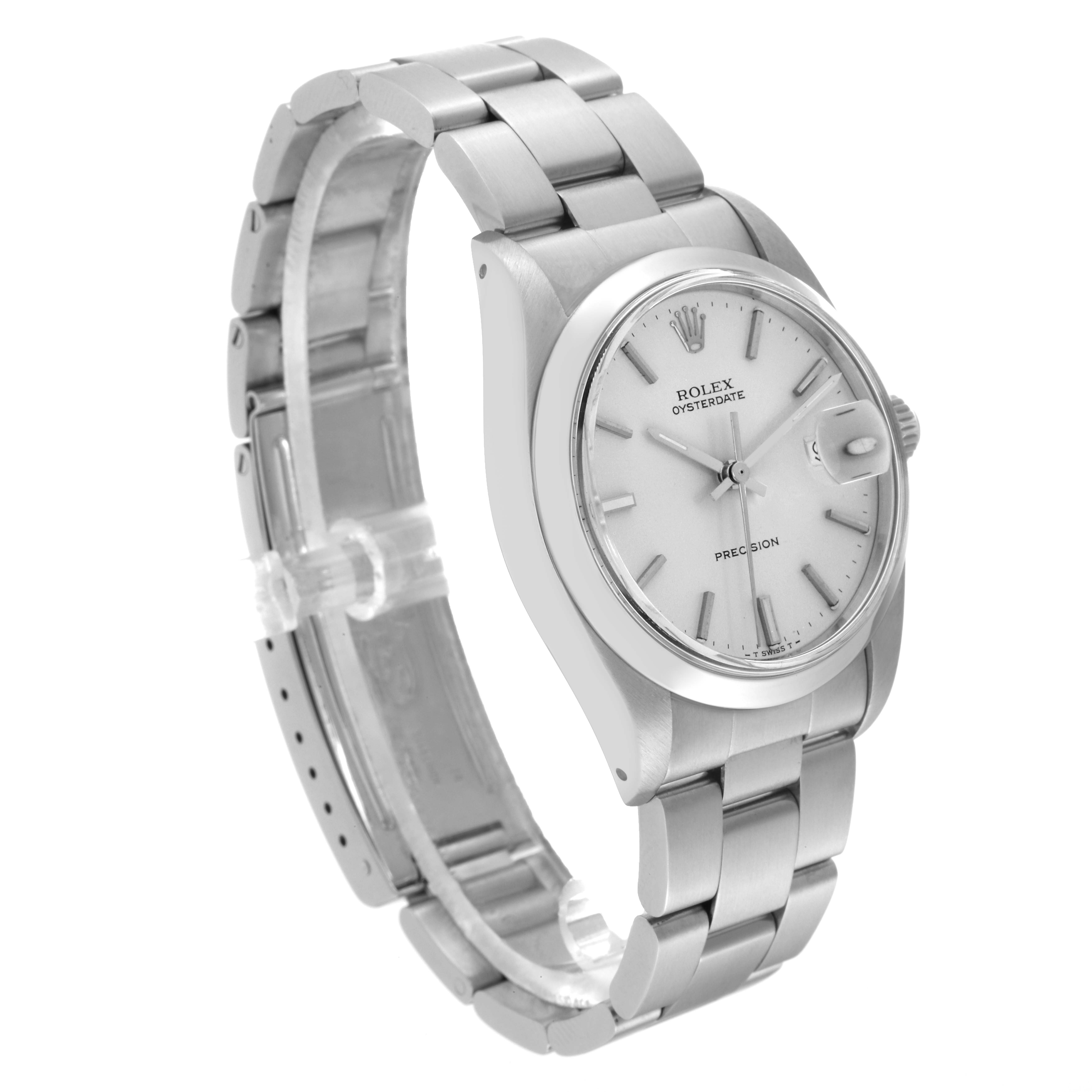 The Vintage Collection Rolex watch is shown at a three-quarter angle, displaying the face, bracelet, and side profile.