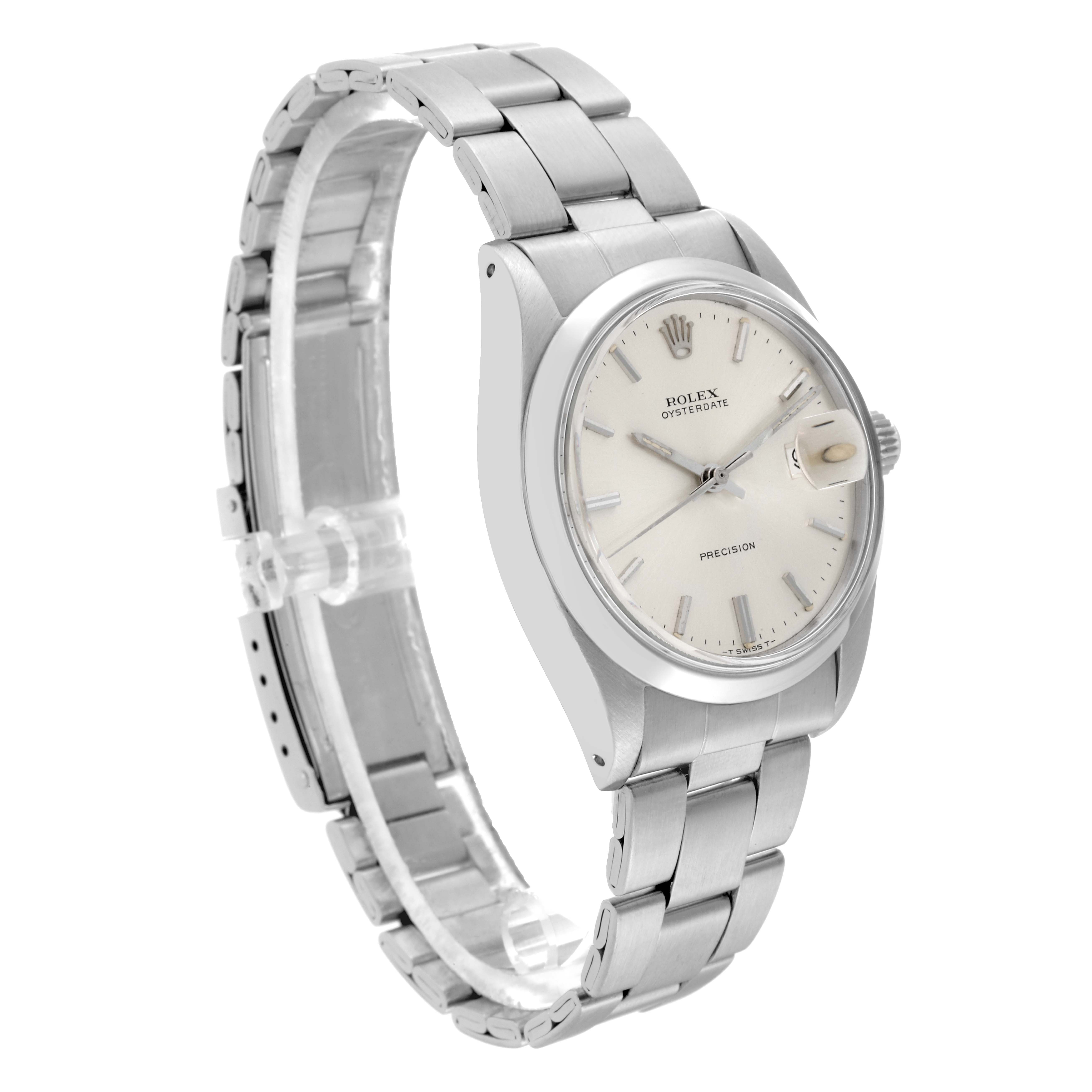 The image shows a side-angle view of the Vintage Collection Rolex watch, highlighting the face, case, and metal bracelet.