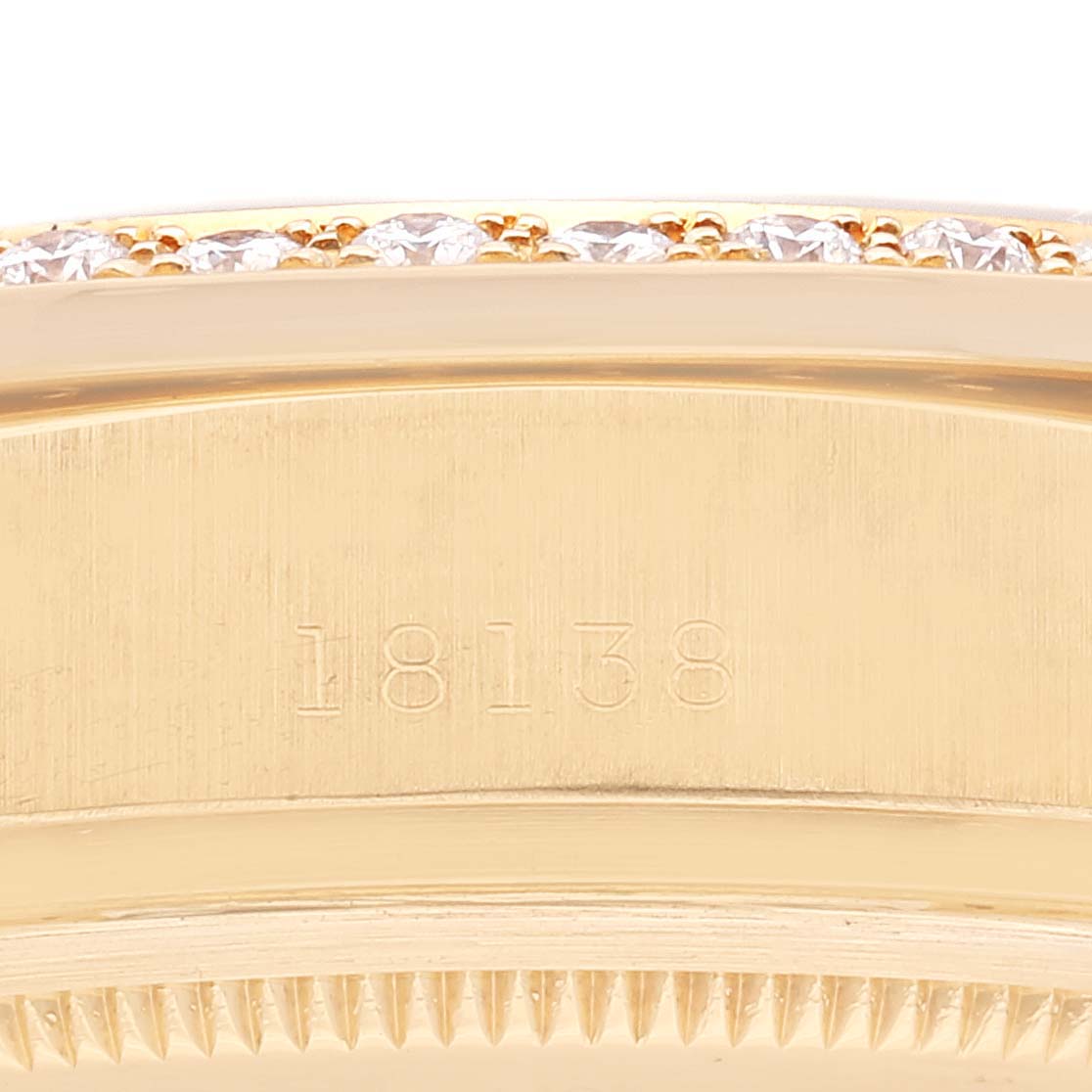 The image shows a close-up of the case and bezel of a Rolex President 18138 Men's Yellow Gold Black Dial 18138 Men's Yellow Gold Black Dial model watch with reference number 18138.