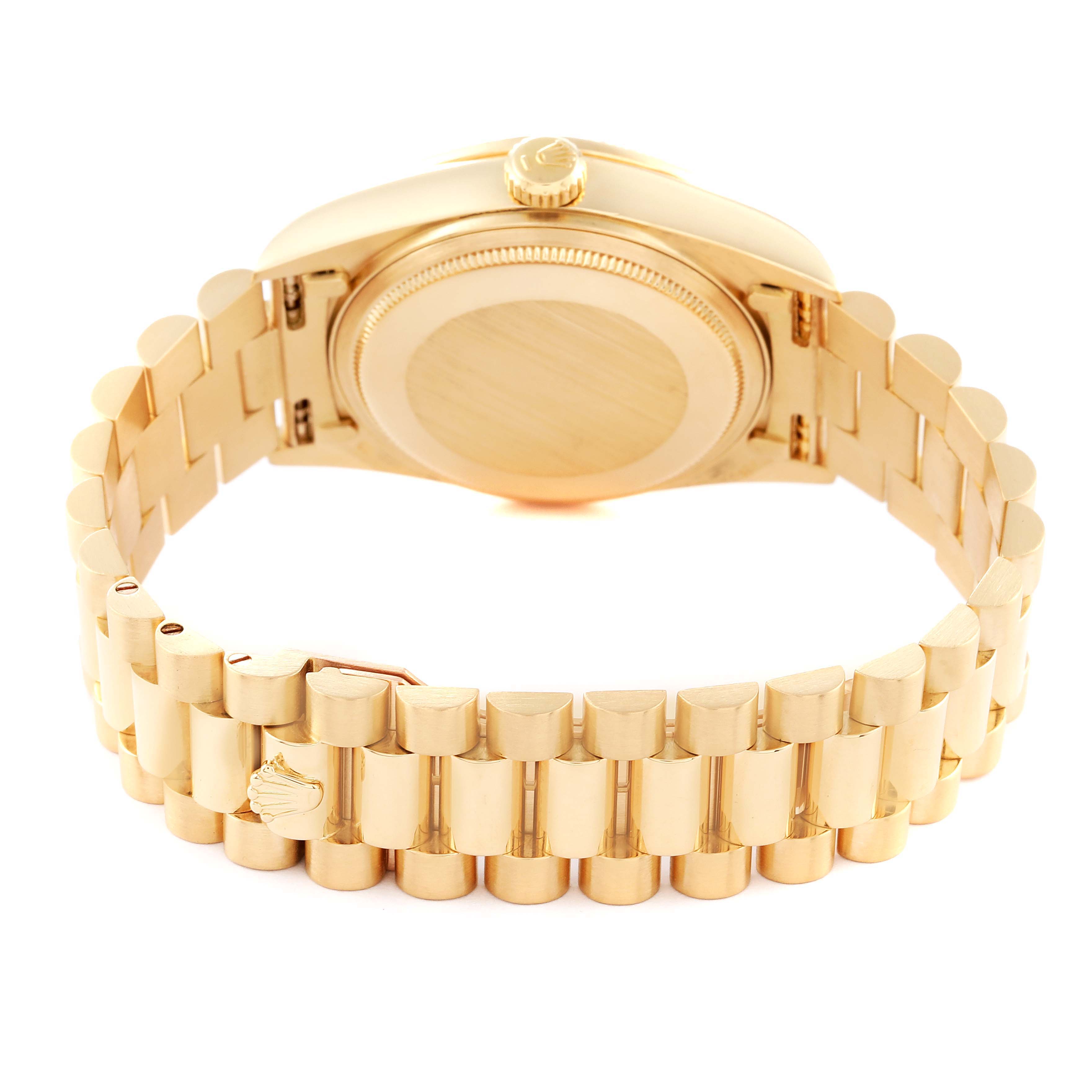 This image shows the back of the Rolex President 18138 Men's Yellow Gold Black Dial 18138 Men's Yellow Gold Black Dial model watch, including the case back and part of the bracelet.