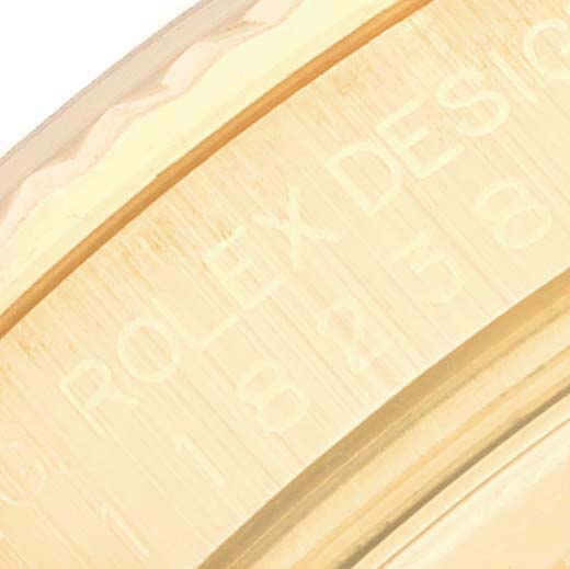 The image shows a close-up view of the engraved inner bezel of a Rolex President 118238 Men
s Yellow Gold Mother of Pearl Dial 118238 Men
s Yellow Gold Mother of Pearl Dial model watch.