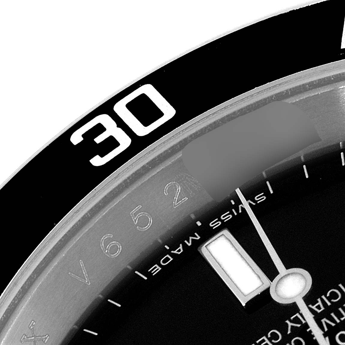 The image shows a close-up of the bezel, part of the dial, and a minute hand of the Rolex Submariner 16610 Men
s Stainless Steel Black Dial 16610 Men
s Stainless Steel Black Dial watch.