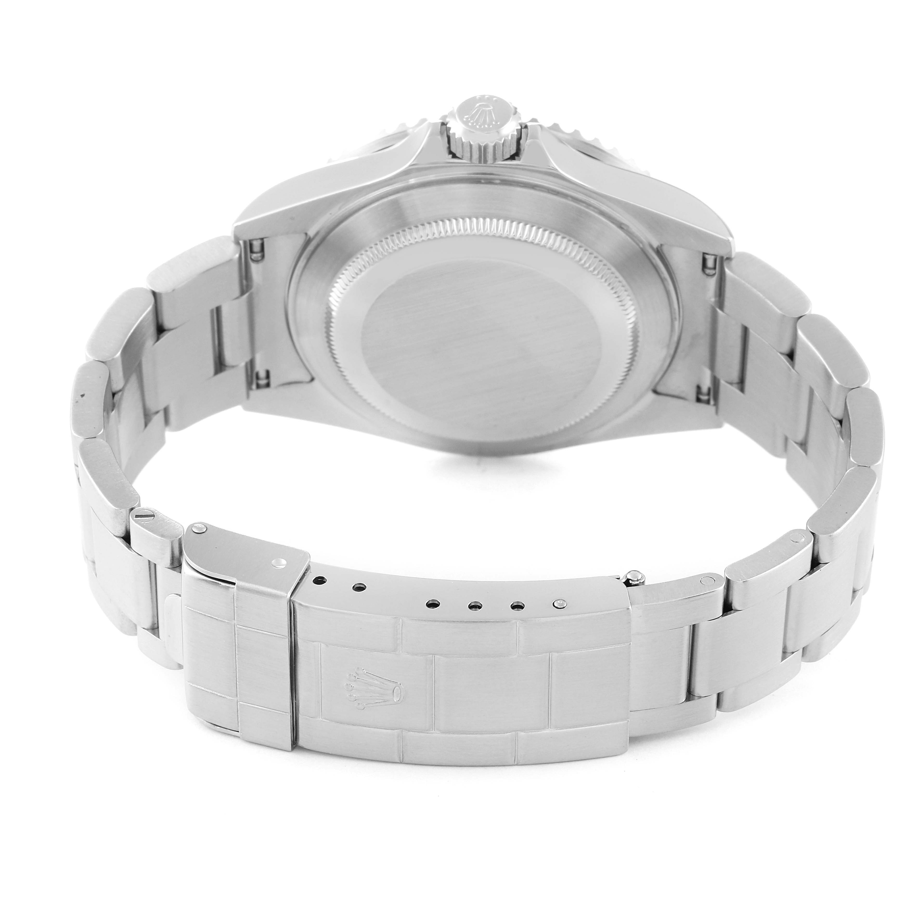 The image shows the backside of a Rolex Submariner 16610 Men
s Stainless Steel Black Dial 16610 Men
s Stainless Steel Black Dial watch, including the case back and bracelet clasp.