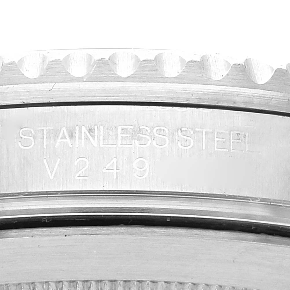 The image shows a close-up of the bezel and outer edge of the case of a Rolex Submariner 16610 Men
s Stainless Steel Black Dial 16610 Men
s Stainless Steel Black Dial, featuring "STAINLESS STEEL" and the reference number.