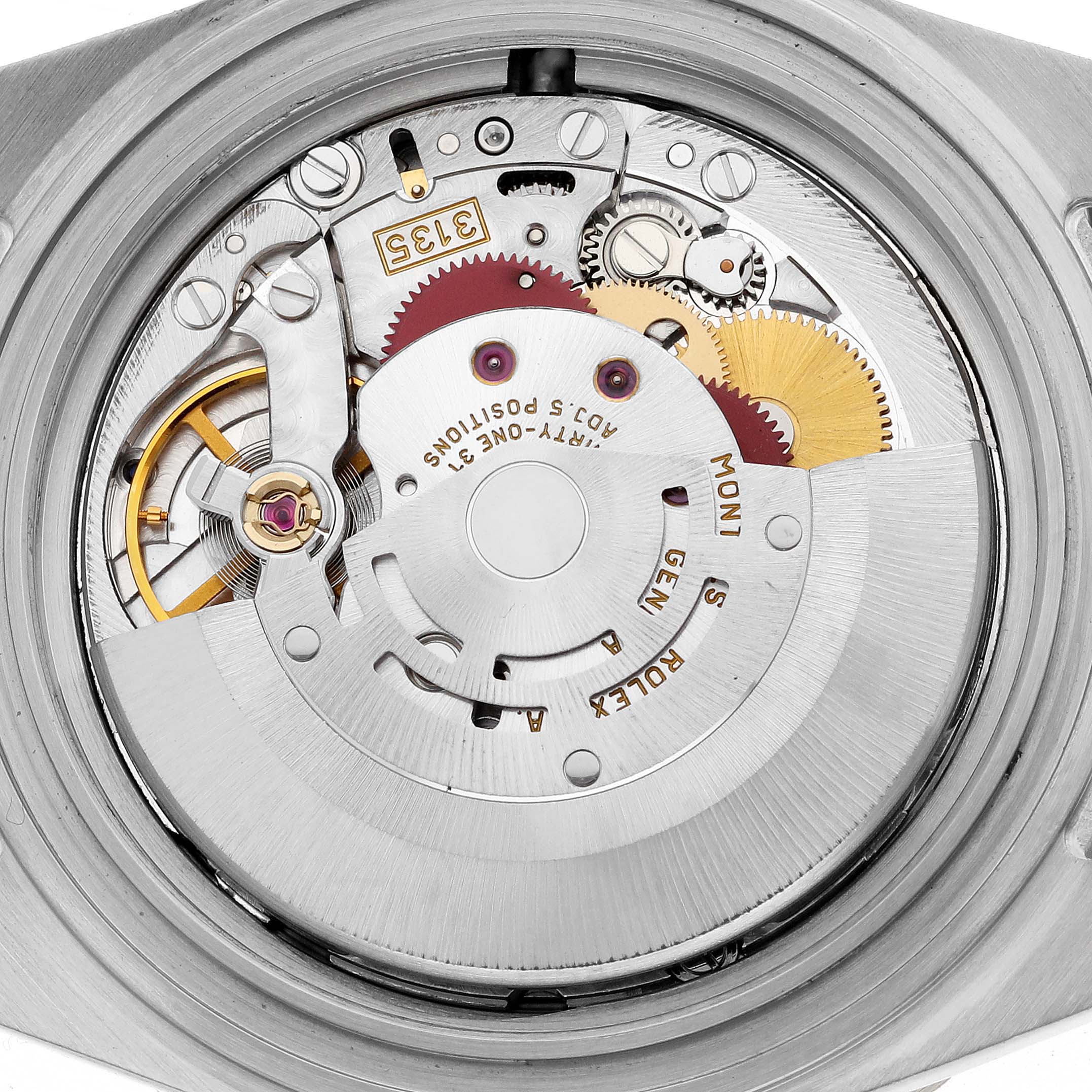 This image shows the internal movement mechanism of a Rolex Submariner 16613 Men's Steel and Gold (two tone) Blue Dial 16613 Men's Steel and Gold (two tone) Blue Dial watch from a rear angle.