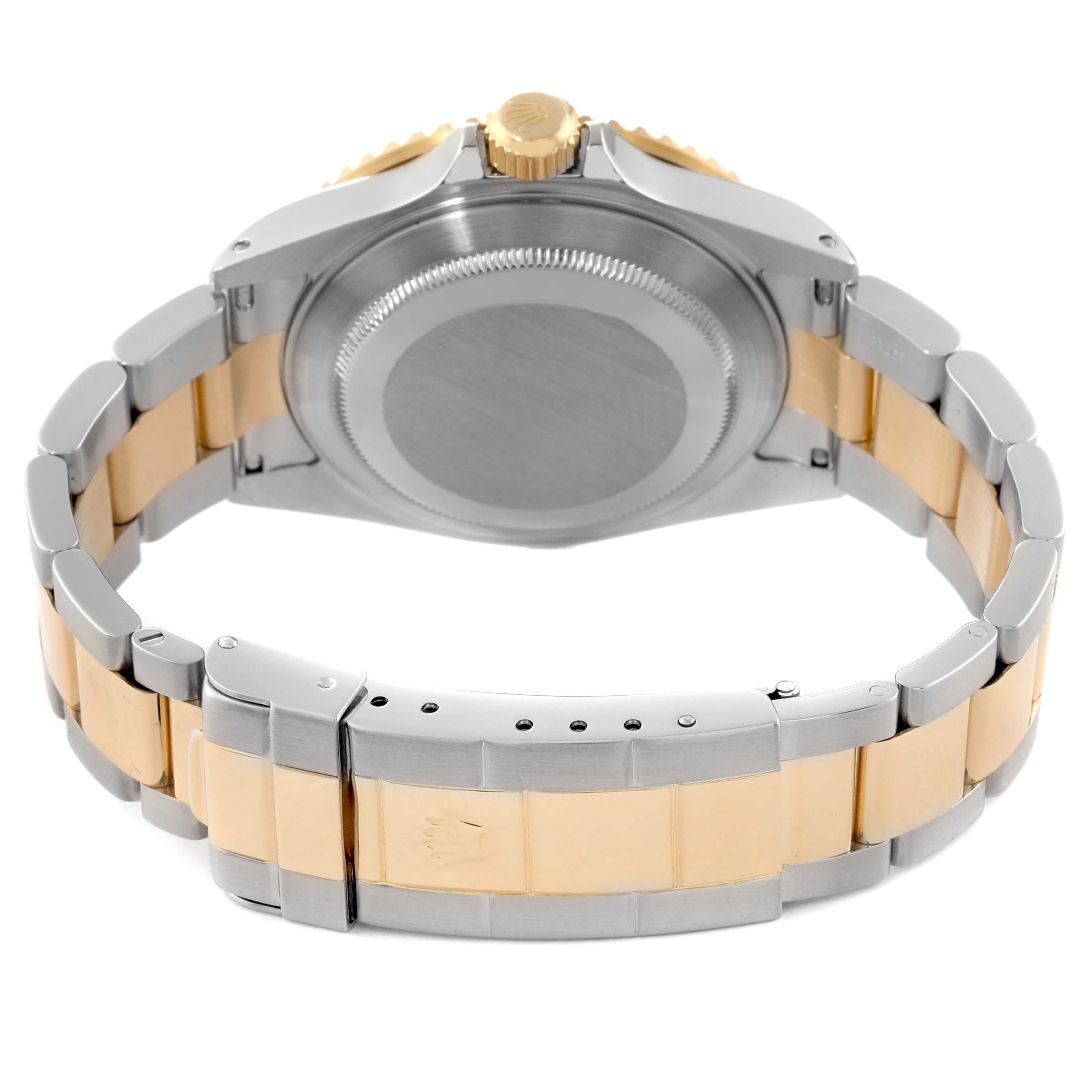 The image shows the back case, crown, and bracelet of a Rolex Submariner 16613 Men's Steel and Gold (two tone) Blue Dial 16613 Men's Steel and Gold (two tone) Blue Dial watch from a rear angle.