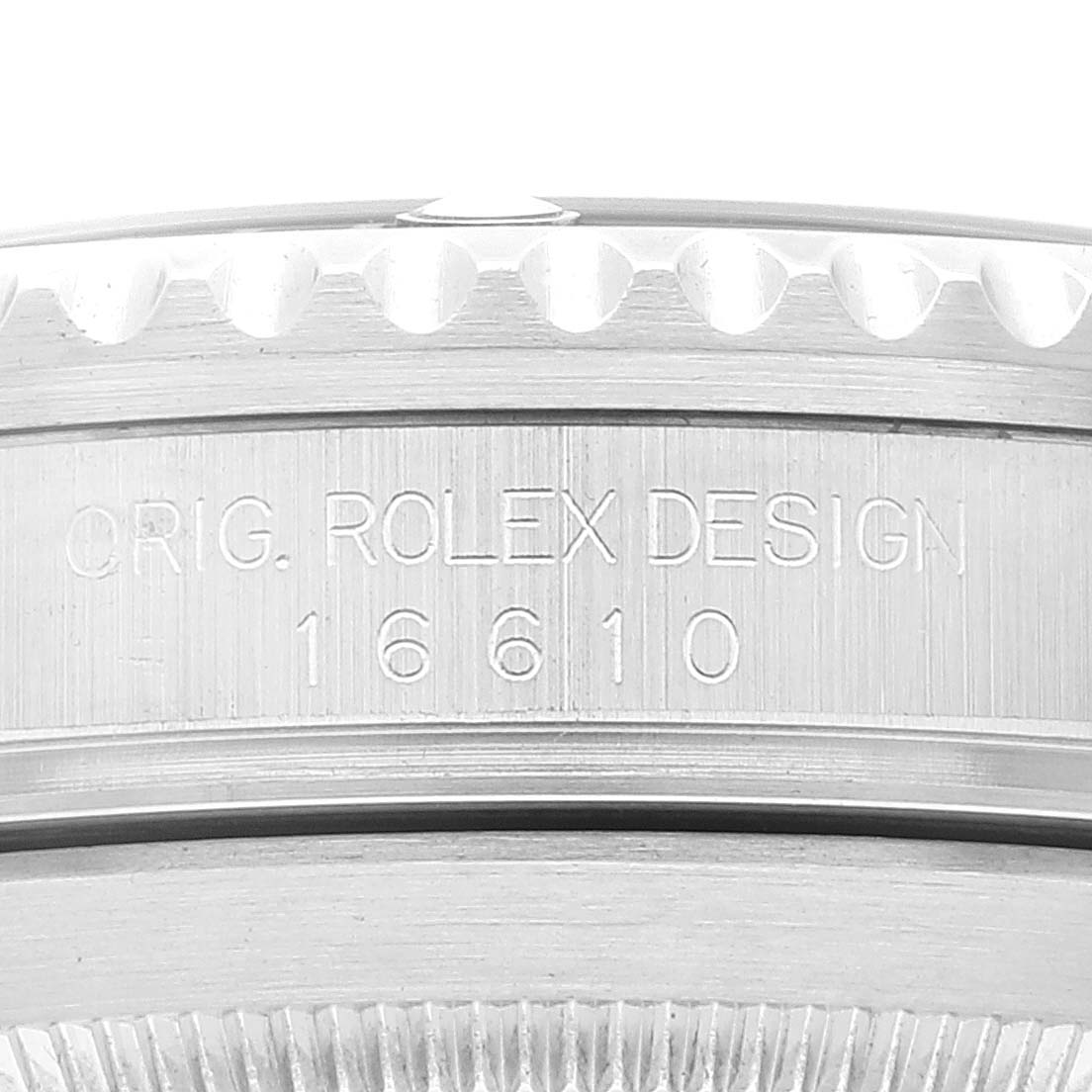 This image shows a close-up of the model and serial number engraving on the side case of a Rolex Submariner 16610 Men
s Stainless Steel Black Dial 16610 Men
s Stainless Steel Black Dial watch.