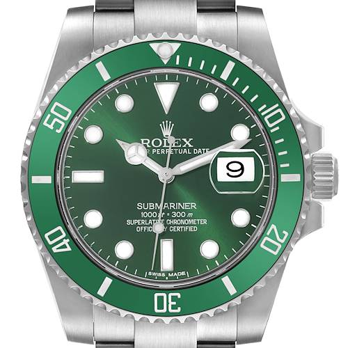 The image shows a frontal view of a Rolex Submariner watch, displaying the dial, bezel, crown, and date magnifier.