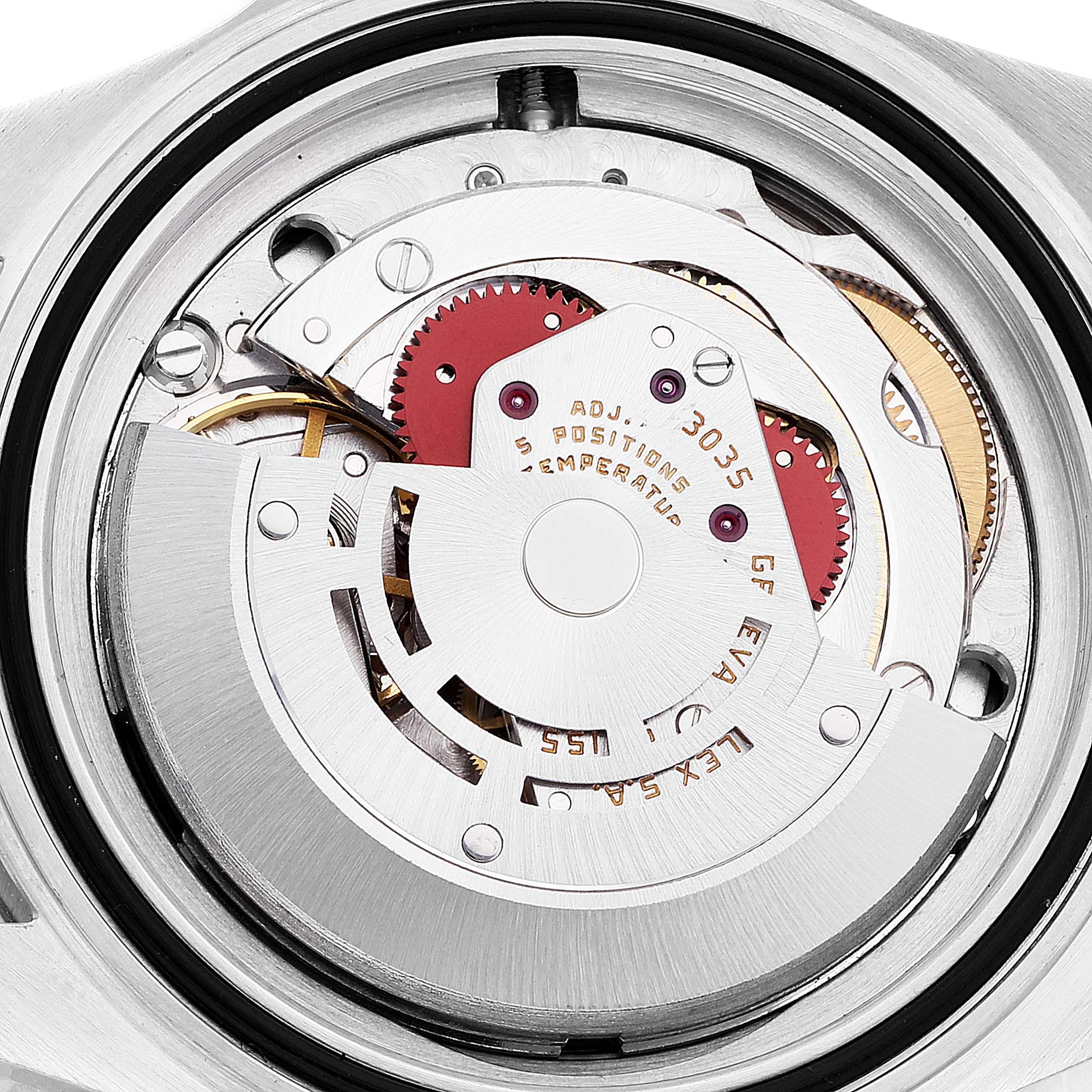 This is a close-up view of the movement and inner mechanisms of a Rolex Submariner 168000 Men
s Stainless Steel Black Dial 168000 Men
s Stainless Steel Black Dial watch.