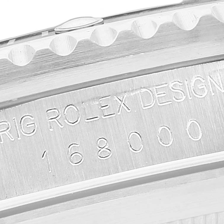 This is a close-up angle showing the engraved model and design details on the side of a Rolex Submariner 168000 Men
s Stainless Steel Black Dial 168000 Men
s Stainless Steel Black Dial watch case.