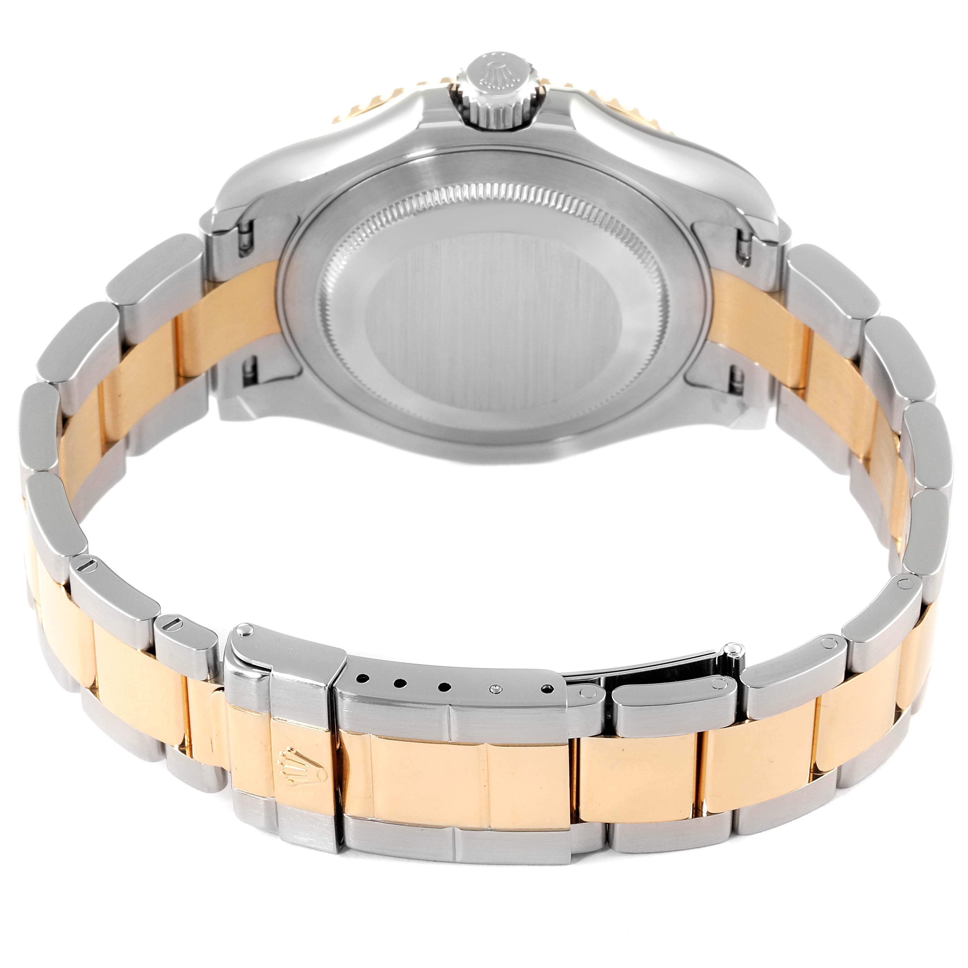 This image shows the back case and two-tone bracelet of a Rolex Yacht-Master 16623 Men
s Steel and Gold (two tone) White Dial 16623 Men
s Steel and Gold (two tone) White Dial watch, viewed from the rear angle.