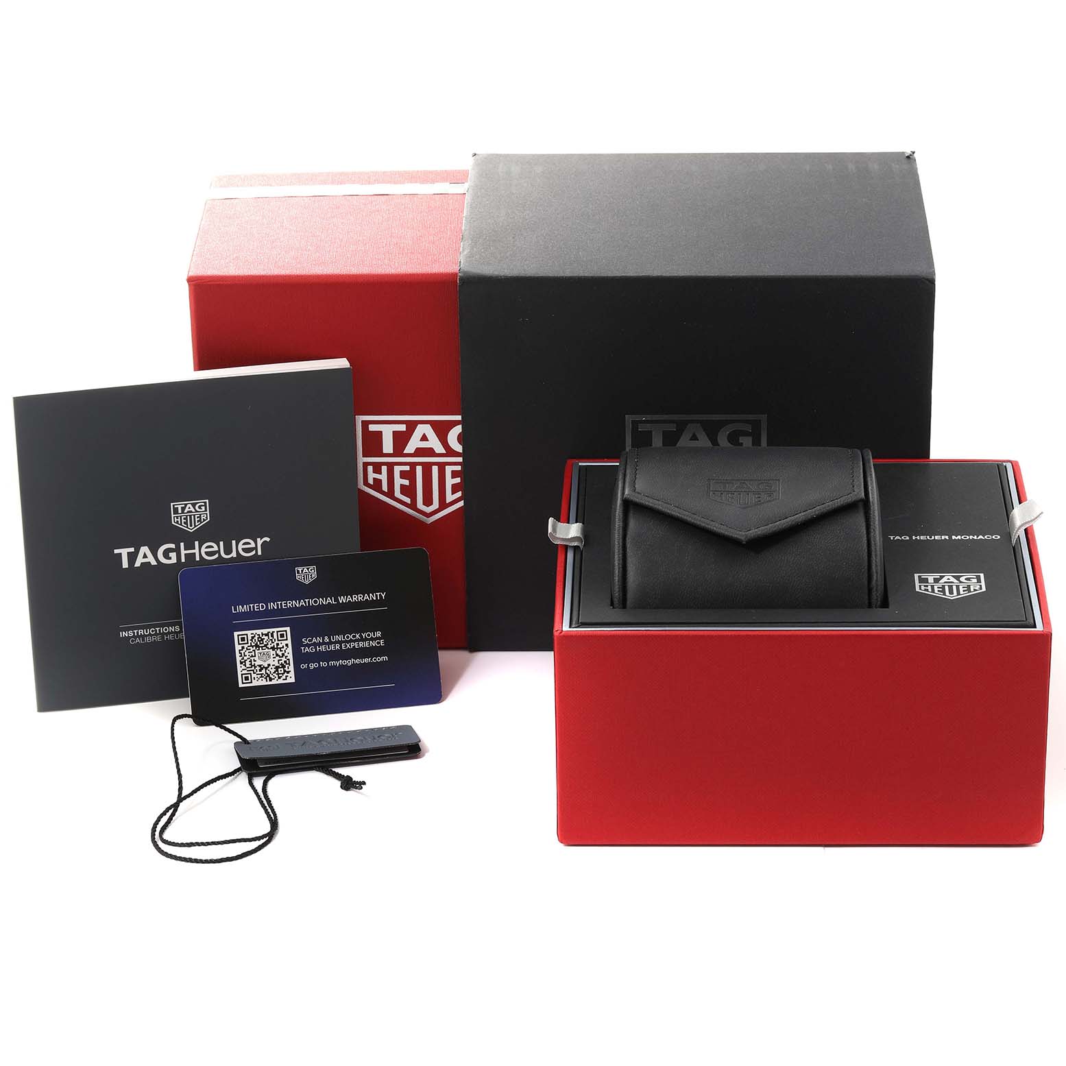 The image shows a Tag Heuer Monaco CBL2111.BA0644 Men's Stainless Steel Blue Dial CBL2111.BA0644 Men's Stainless Steel Blue Dial watch box, warranty cards, instruction manual, and a black watch pouch.