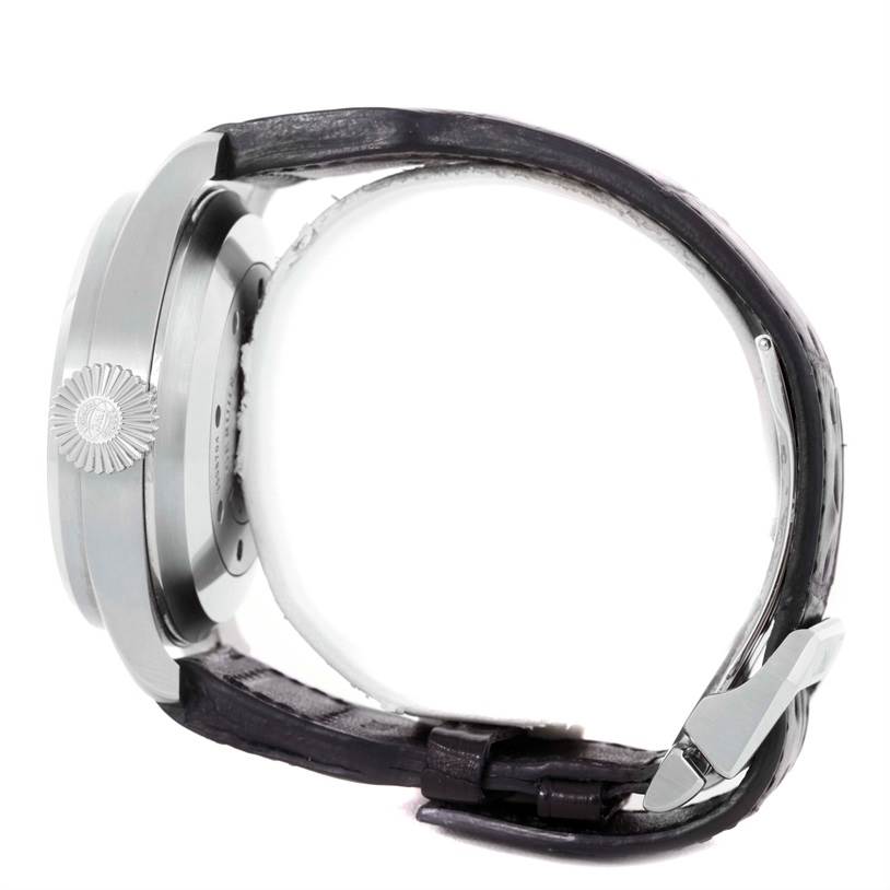 This image shows the side view of an IWC Pilot IW500901 Men's Stainless Steel Black Dial IW500901 Men's Stainless Steel Black Dial model watch, including the crown, case, and part of the leather strap with the clasp.