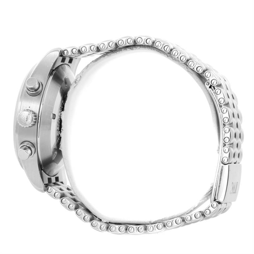 The image shows a side view of an IWC Pilot IW370607 Men's Stainless Steel Black Dial IW370607 Men's Stainless Steel Black Dial model watch, displaying its case, crown, chronograph pushers, and metal bracelet.