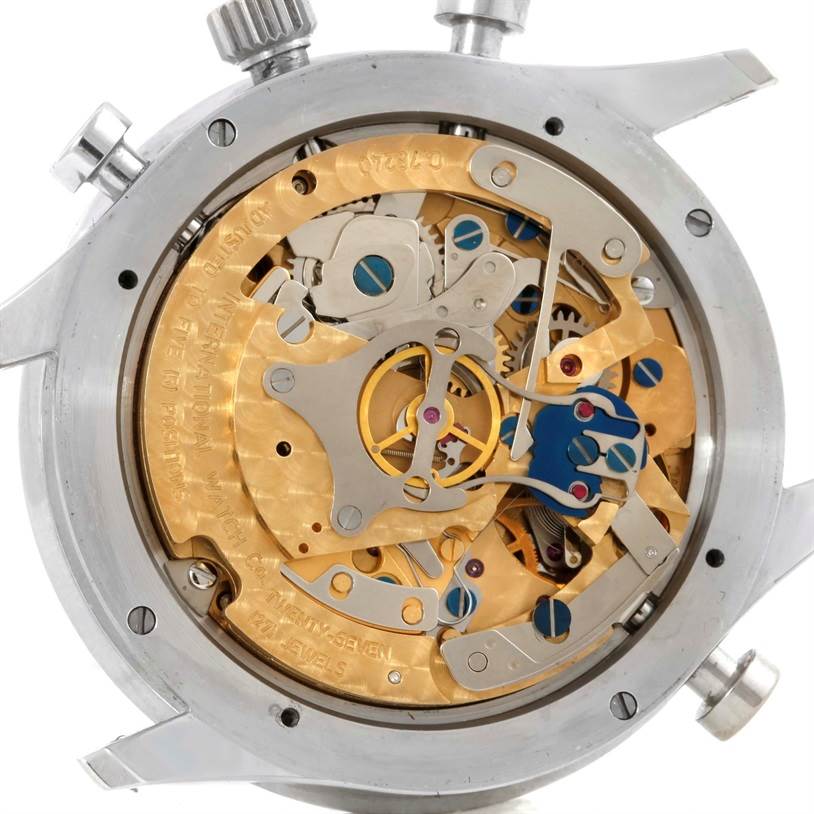 The image shows the back of an IWC Portuguese IW371205 Men's Platinum Silver Dial IW371205 Men's Platinum Silver Dial model watch, revealing its intricate mechanical movement and inner workings.