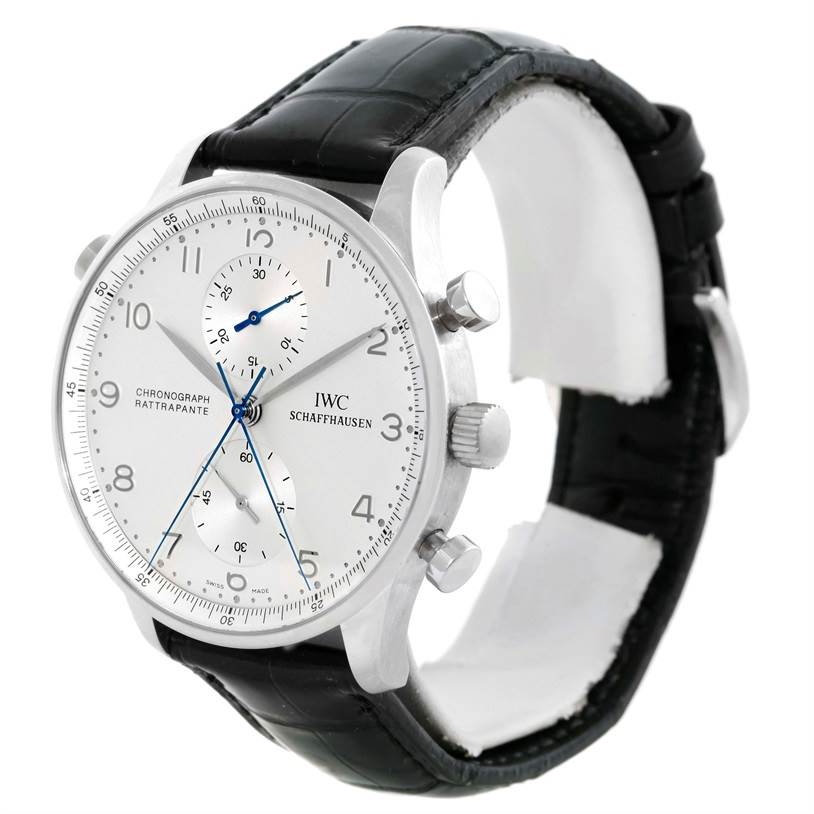 The IWC Portuguese IW371205 Men's Platinum Silver Dial IW371205 Men's Platinum Silver Dial model watch is shown at an angled side view, highlighting the face, crown, and pushers, with a black leather strap.