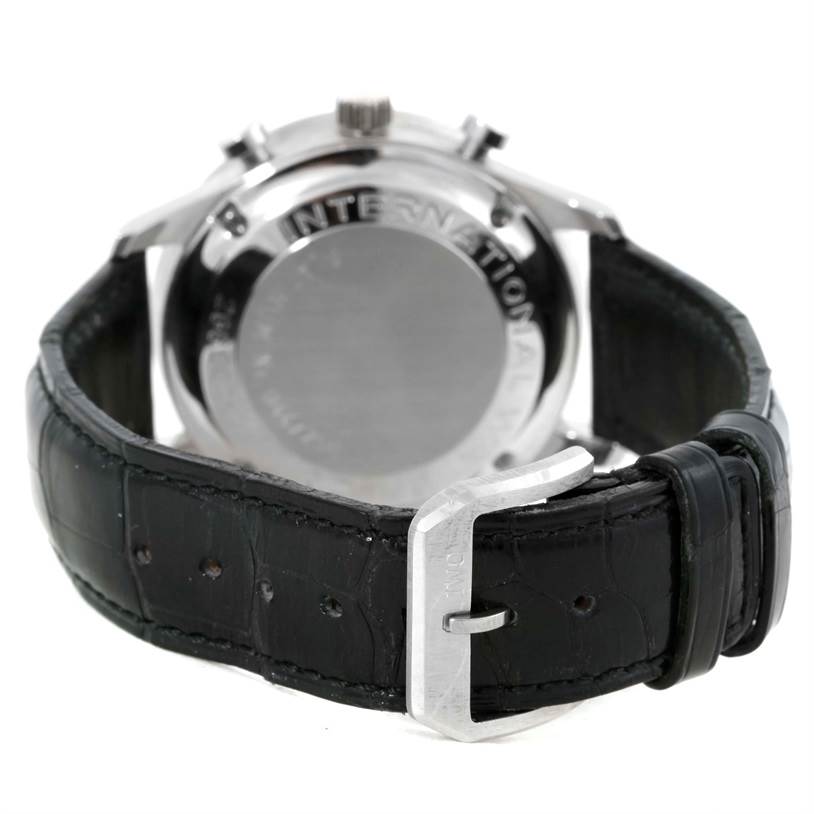 The image shows the back case and leather strap of the IWC Portuguese IW371205 Men's Platinum Silver Dial IW371205 Men's Platinum Silver Dial watch at a slightly tilted rear angle.