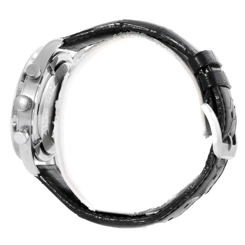 The image shows the side view of an IWC Portuguese IW371205 Men's Platinum Silver Dial IW371205 Men's Platinum Silver Dial watch, highlighting the case, crown, pushers, and black leather strap.