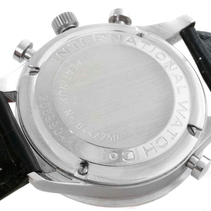 The image shows the back side of an IWC Portuguese IW371205 Men's Platinum Silver Dial IW371205 Men's Platinum Silver Dial model watch, displaying the bezel, case back, crown, and a portion of the strap.