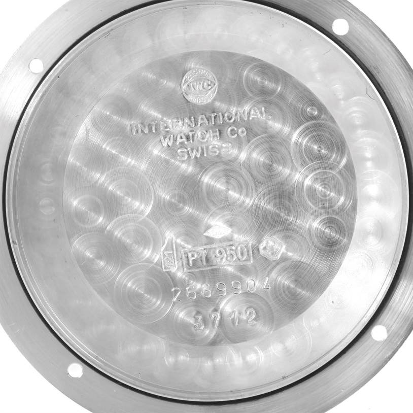 This image shows the interior case back of an IWC Portuguese IW371205 Men's Platinum Silver Dial IW371205 Men's Platinum Silver Dial watch, displaying engravings and hallmarks.