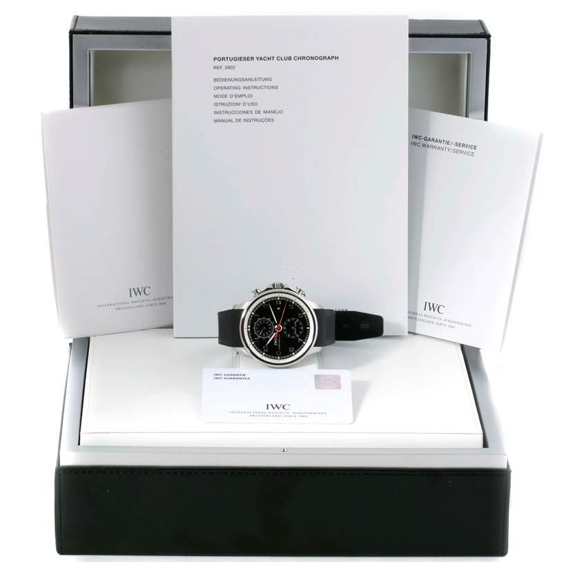 The IWC Portuguese IW390210 Men's Stainless Steel Black Dial IW390210 Men's Stainless Steel Black Dial watch is displayed frontally, accompanied by its box, manuals, and warranty card.