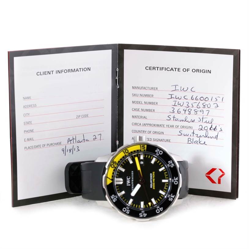 The IWC Aquatimer IW356802 Men
s Stainless Steel Black Dial IW356802 Men
s Stainless Steel Black Dial watch is shown from a front angle along with its certificate of origin booklet.