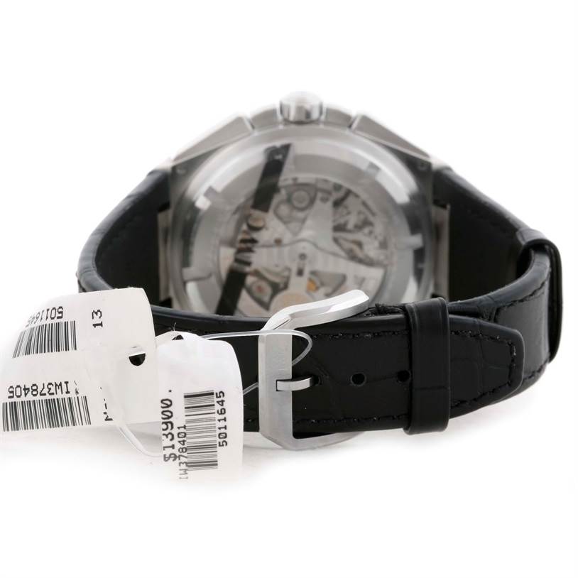 The image shows the IWC Ingenieur IW378405 Men's Stainless Steel Silver Dial IW378405 Men's Stainless Steel Silver Dial watch, focusing on the back case and leather strap with a buckle and attached tags.