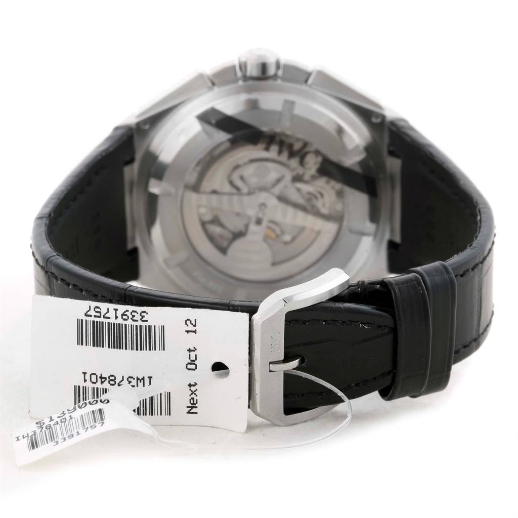 The image shows the back view of the IWC Ingenieur IW378401 Men's Stainless Steel Black Dial IW378401 Men's Stainless Steel Black Dial watch, highlighting its leather strap, clasp, and transparent case back.