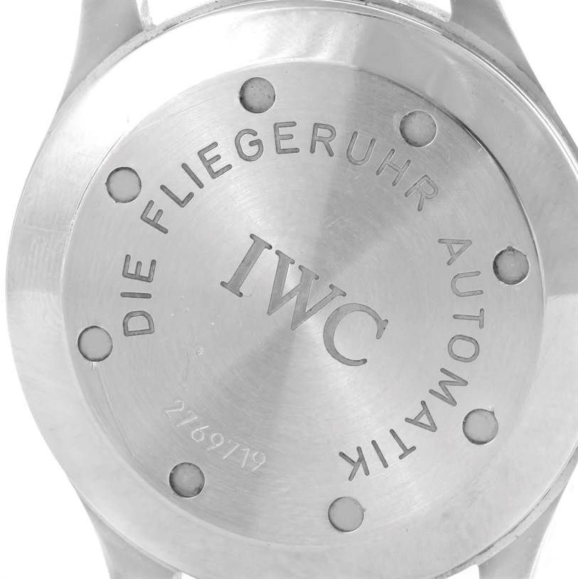 The image shows the back case of an IWC Pilot IW325301 Men's Stainless Steel Black Dial IW325301 Men's Stainless Steel Black Dial model watch, displaying brand engravings.