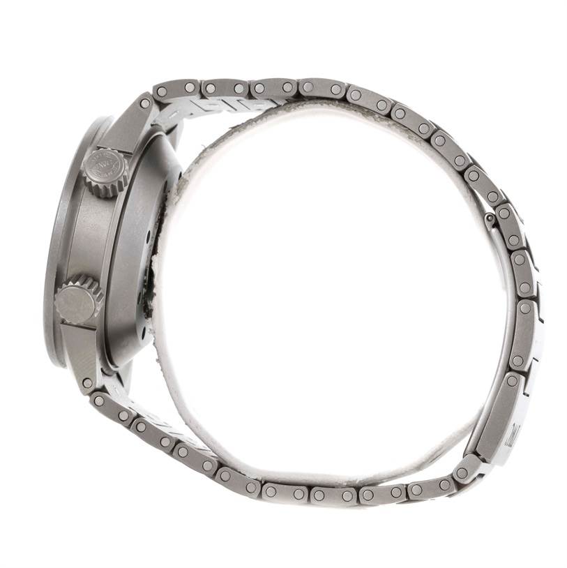 This side view of the IWC Aquatimer IW356802 Men's Titanium Black Dial IW356802 Men's Titanium Black Dial watch showcases the watch case, the crown, and the bracelet.