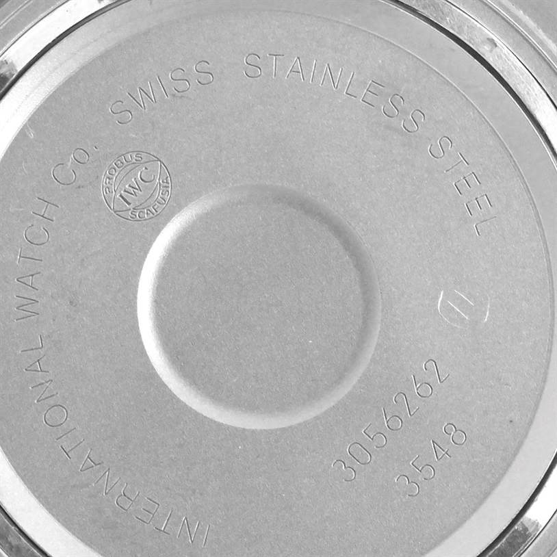 The image shows the back casing of an IWC Aquatimer IW354807 Men's Stainless Steel Black Dial IW354807 Men's Stainless Steel Black Dial watch engraved with specifications like "Swiss Stainless Steel."