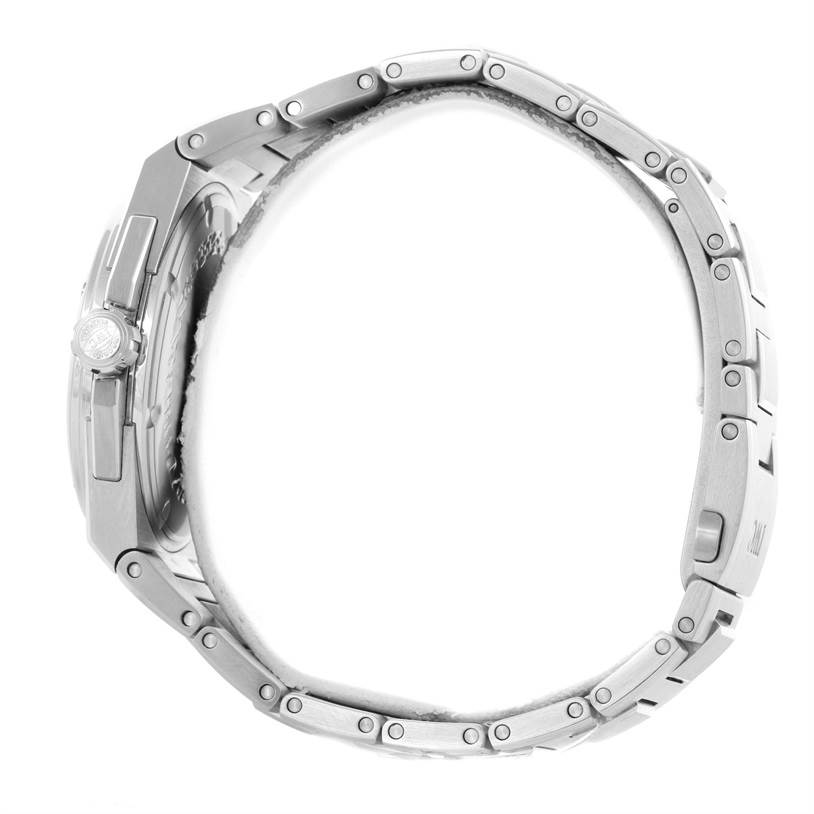 The IWC Ingenieur IW323904 Men's Stainless Steel Silver Dial IW323904 Men's Stainless Steel Silver Dial watch is shown from the side, displaying its case, crown, and bracelet.