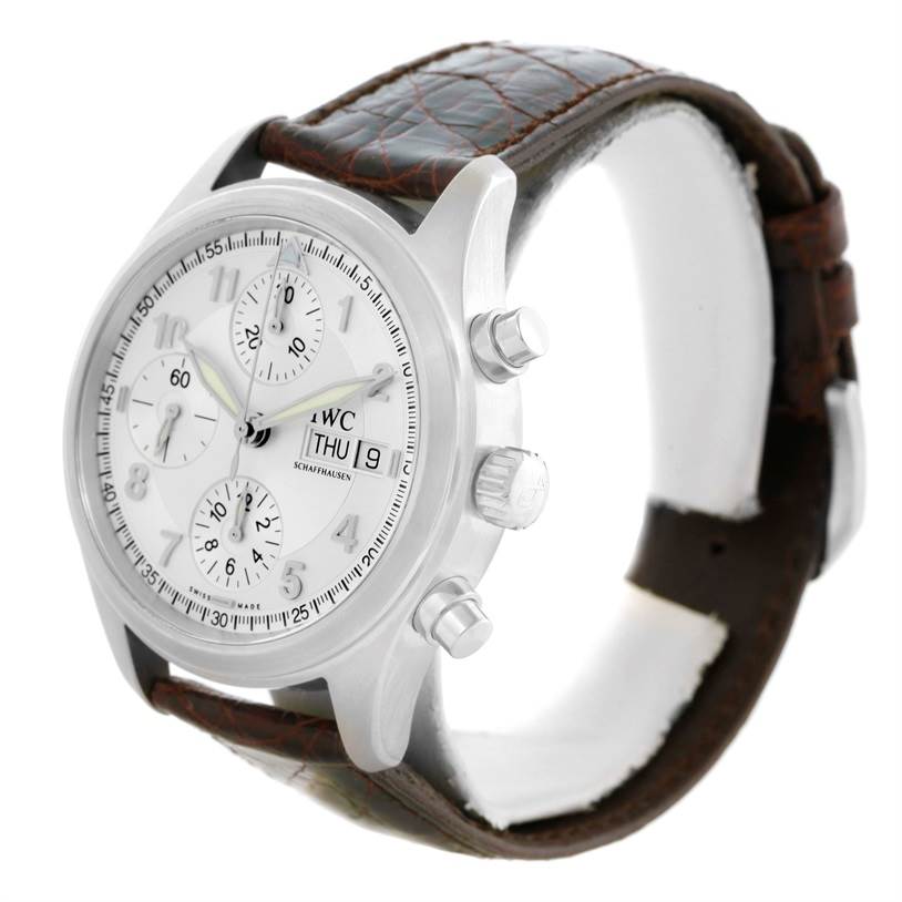 The IWC Pilot IW325110 Men's Stainless Steel Silver Dial IW325110 Men's Stainless Steel Silver Dial model watch is shown at an angled front view, highlighting its dial, chronograph subdials, crown, pushers, and leather strap.