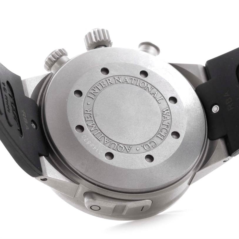The image shows the back case and two crowns of an IWC Aquatimer IW372304 Men's Titanium Black Dial IW372304 Men's Titanium Black Dial watch from a rear angle.