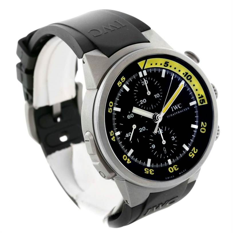 The IWC Aquatimer IW372304 Men's Titanium Black Dial IW372304 Men's Titanium Black Dial watch is shown at a three-quarter angle, highlighting the face, bezel, and black rubber strap.